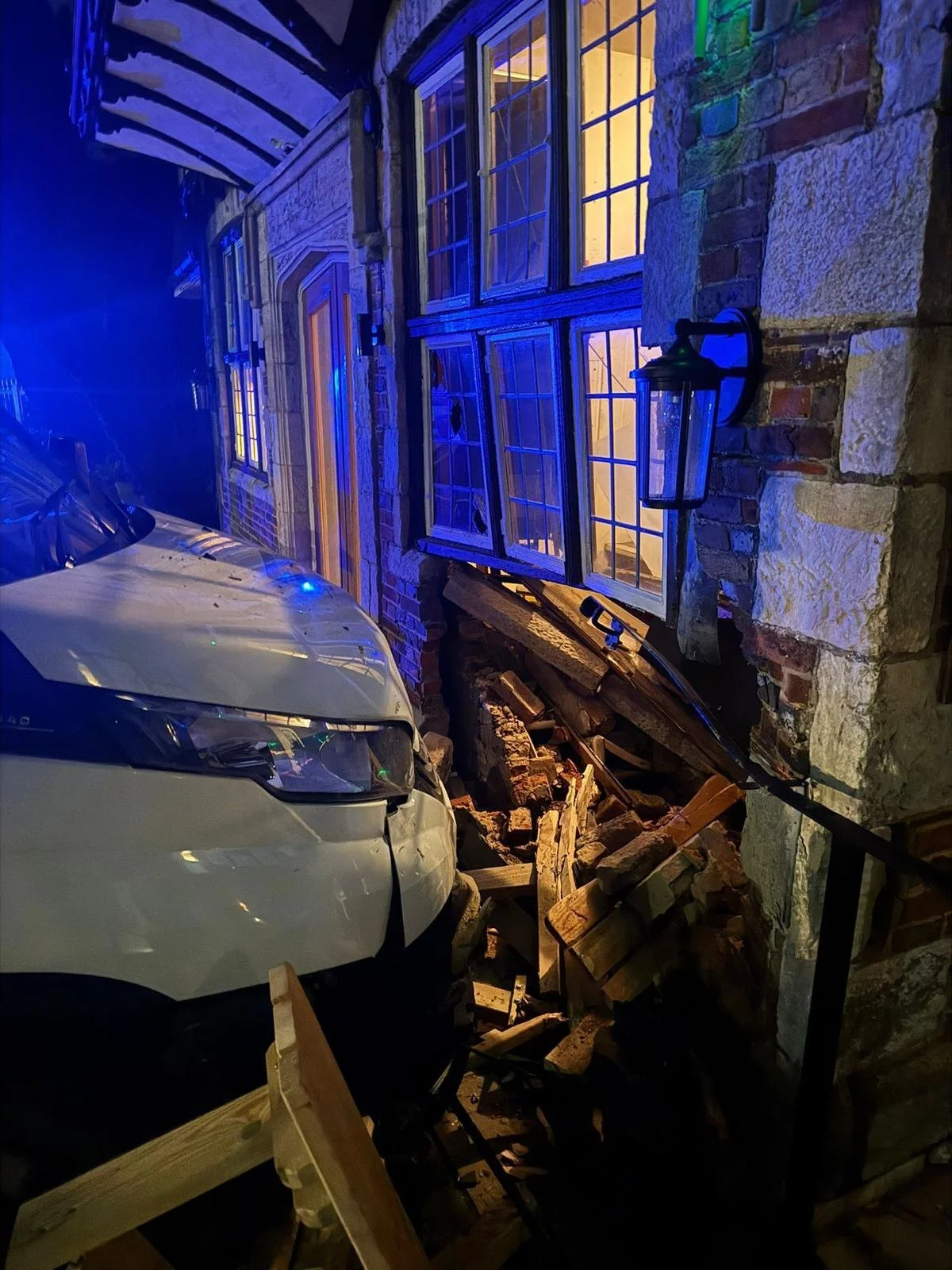 Van crashed into the corner of a historic pub in Polegate at night