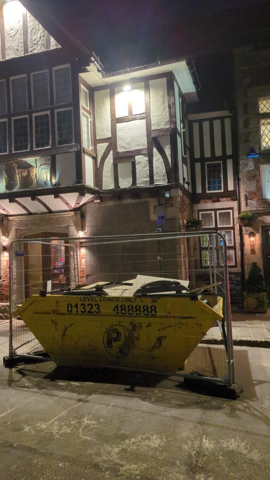 Opening propped and boarded inside a pub in Polegate after structural damage