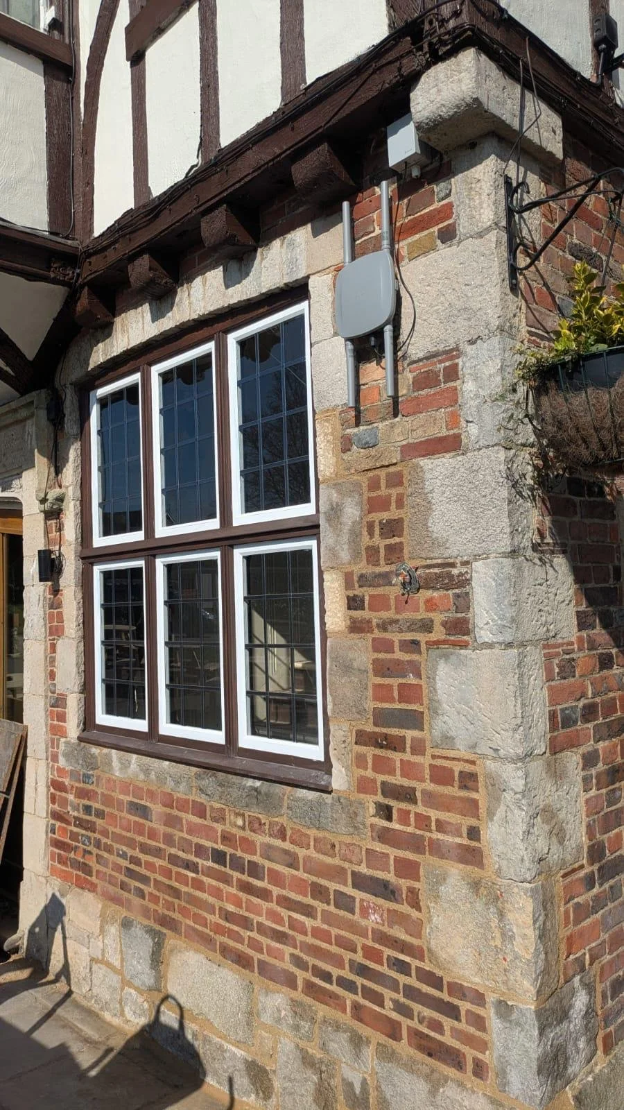 Finished repair to the brick and stone frontage of a pub in Polegate