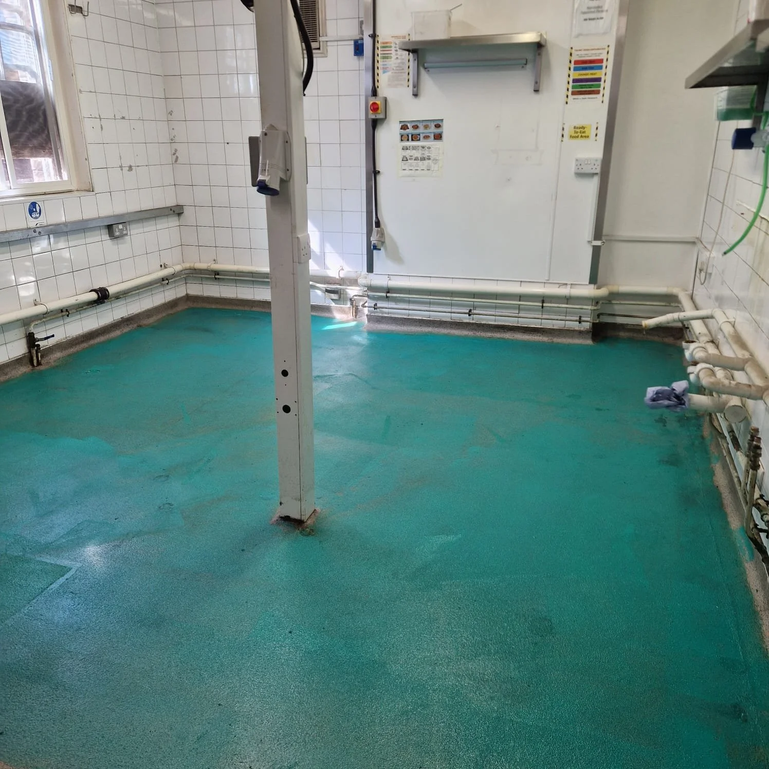 Old floor lifted in a Kitchen pub in Sutton