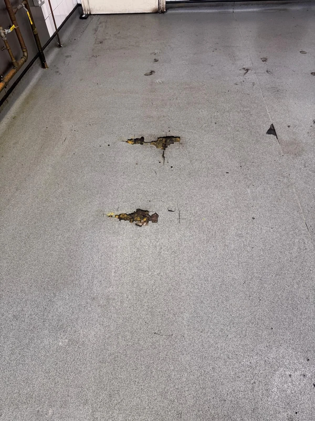 Image: Cracks in a commercial kitchen floor