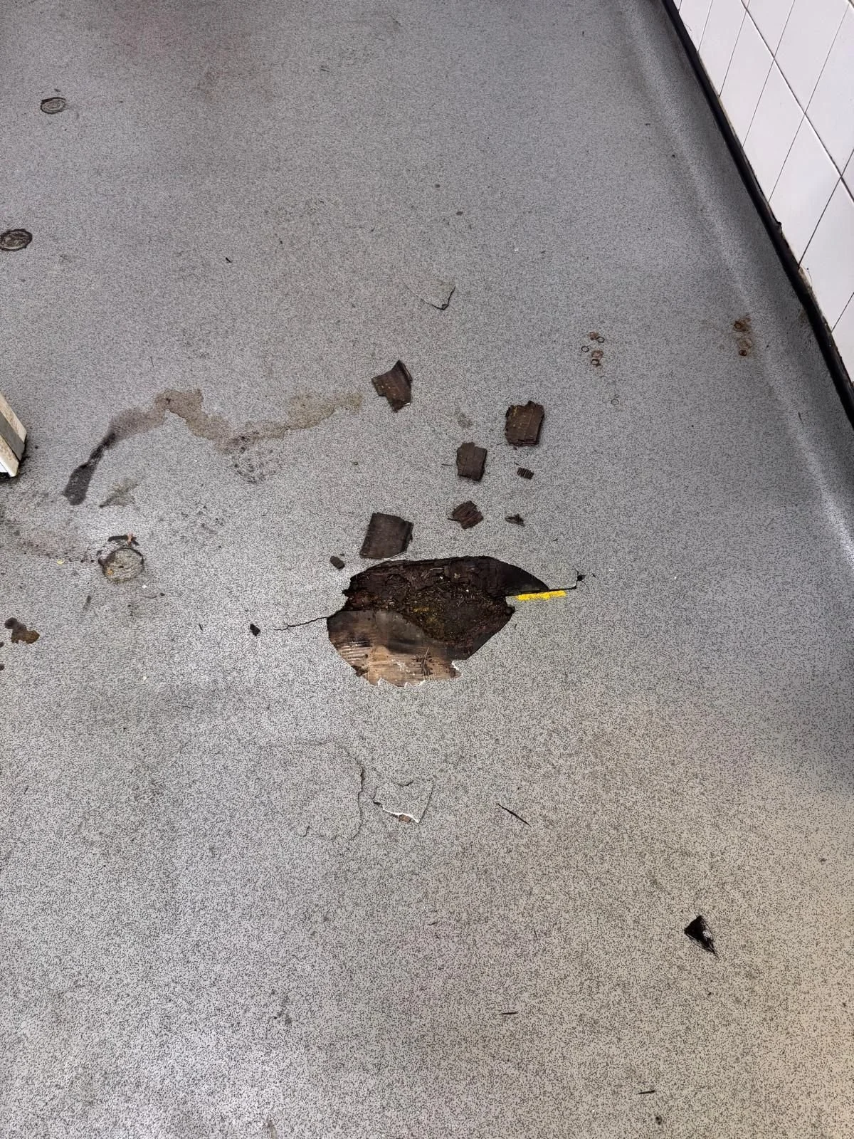 Image: Cracks in a commercial kitchen floor