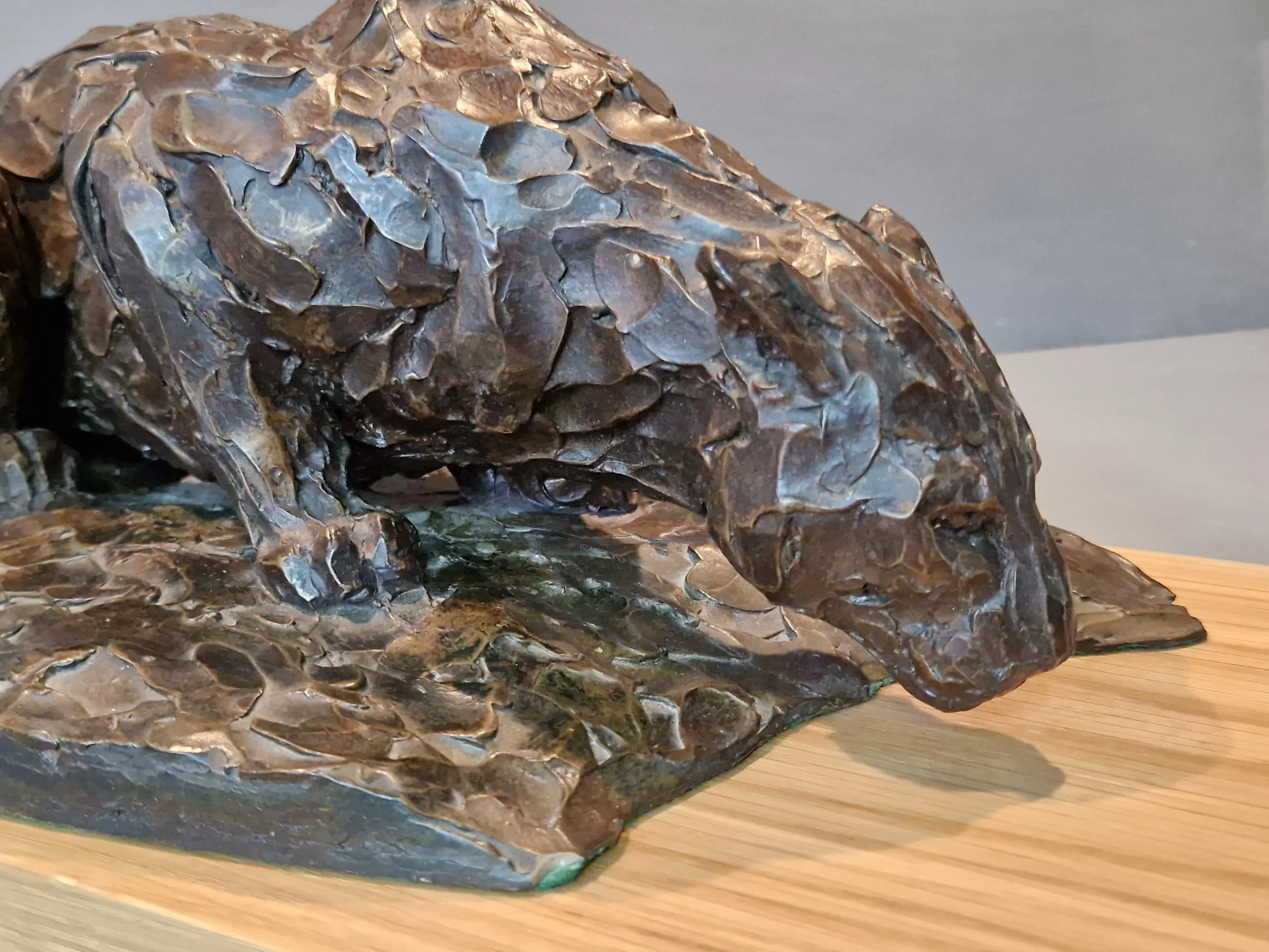 bronze drinking cat close.jpg