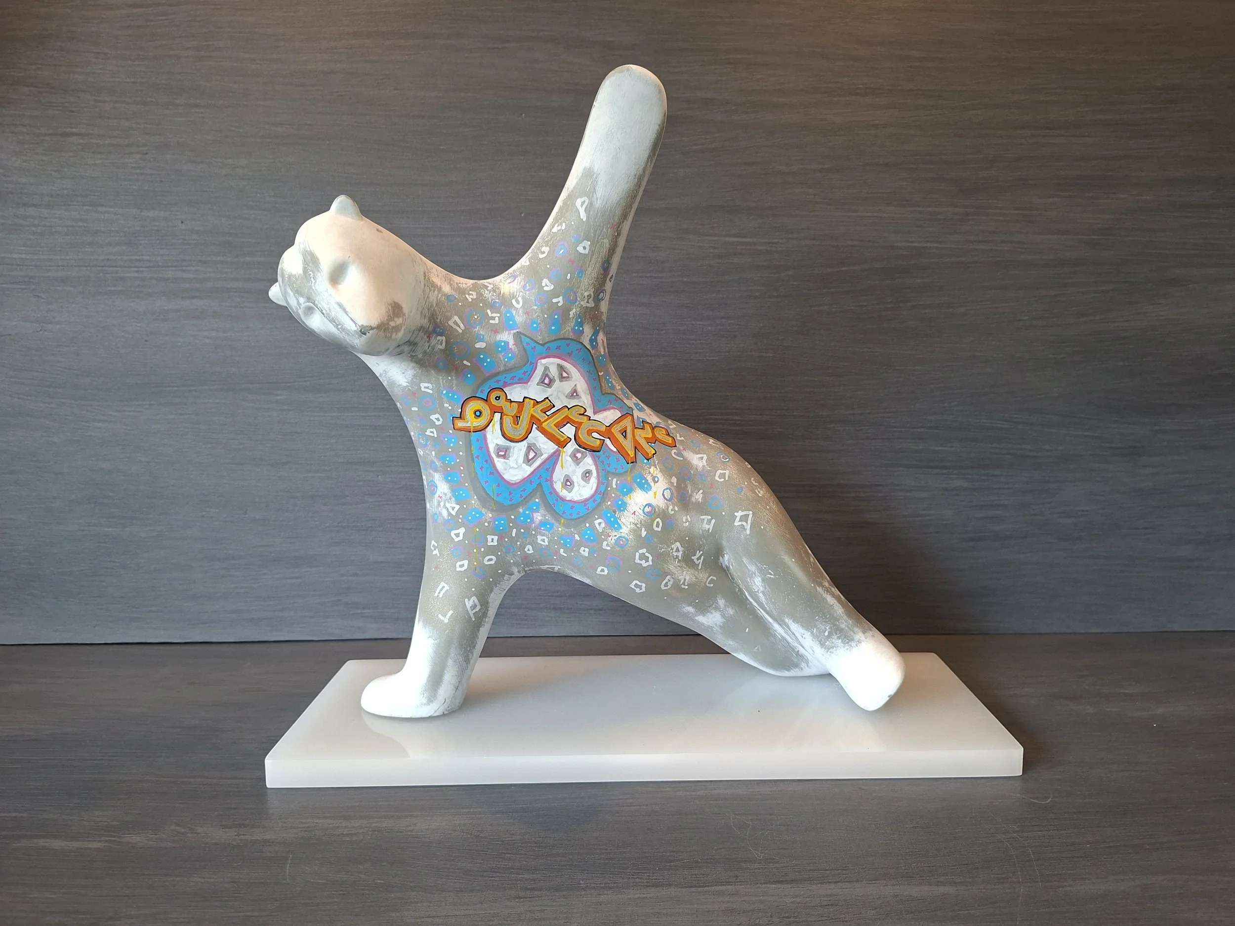Artic Circle Side Plank Bear- Written in Inuit Inuktitut syllabary describing the danger the Artic is exposed to.
Acrylic  H36cm  W34cm  D14cm
£675.00