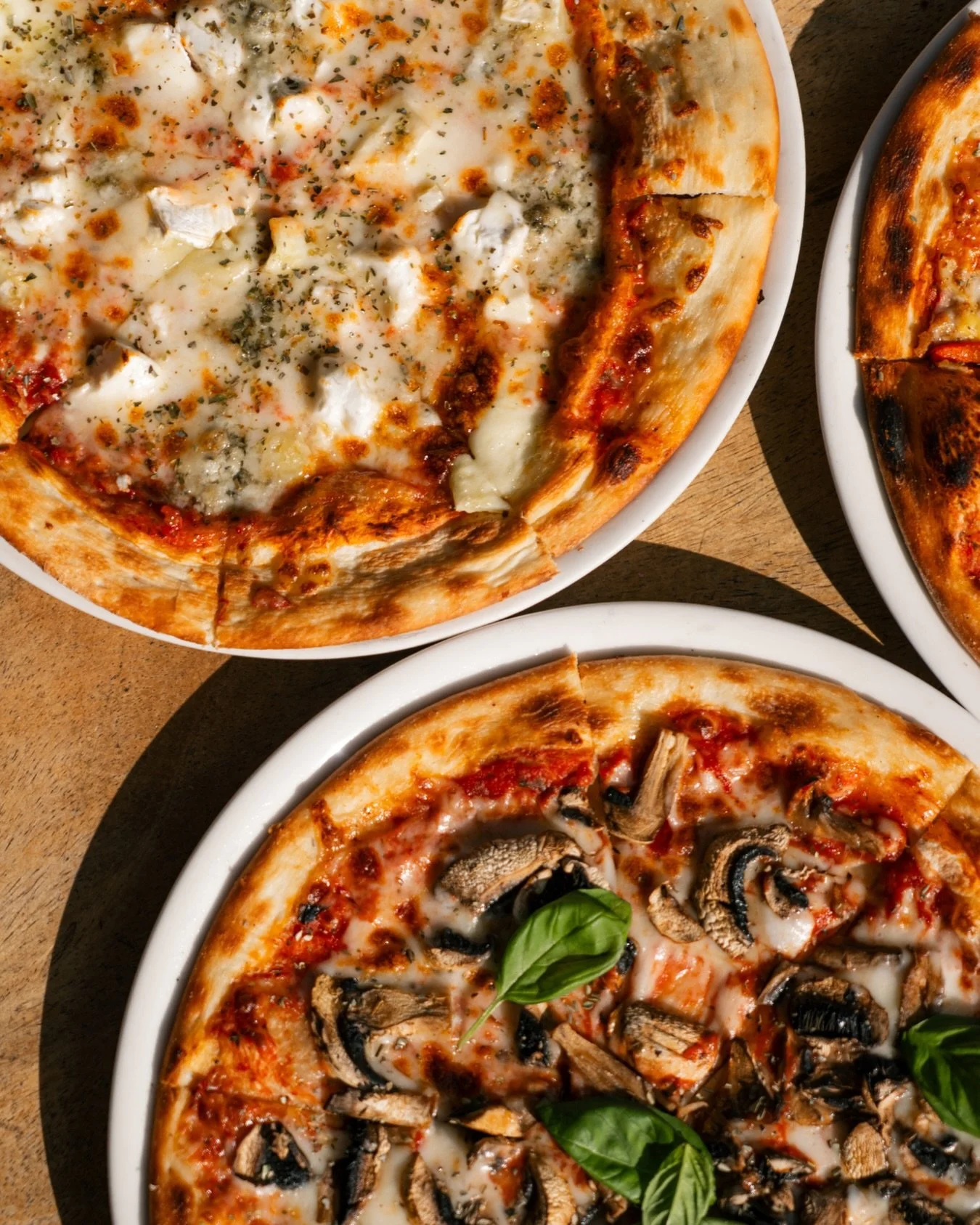 Catch the flame, taste the tradition: Our stone oven pizzas will have you coming back for more!