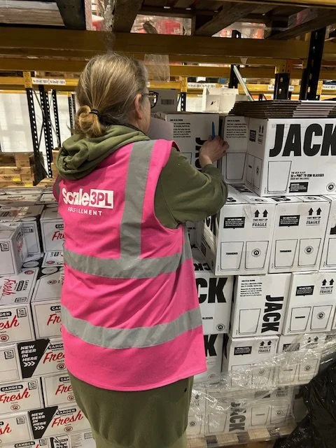 Scale 3PL team member picking boxed stock