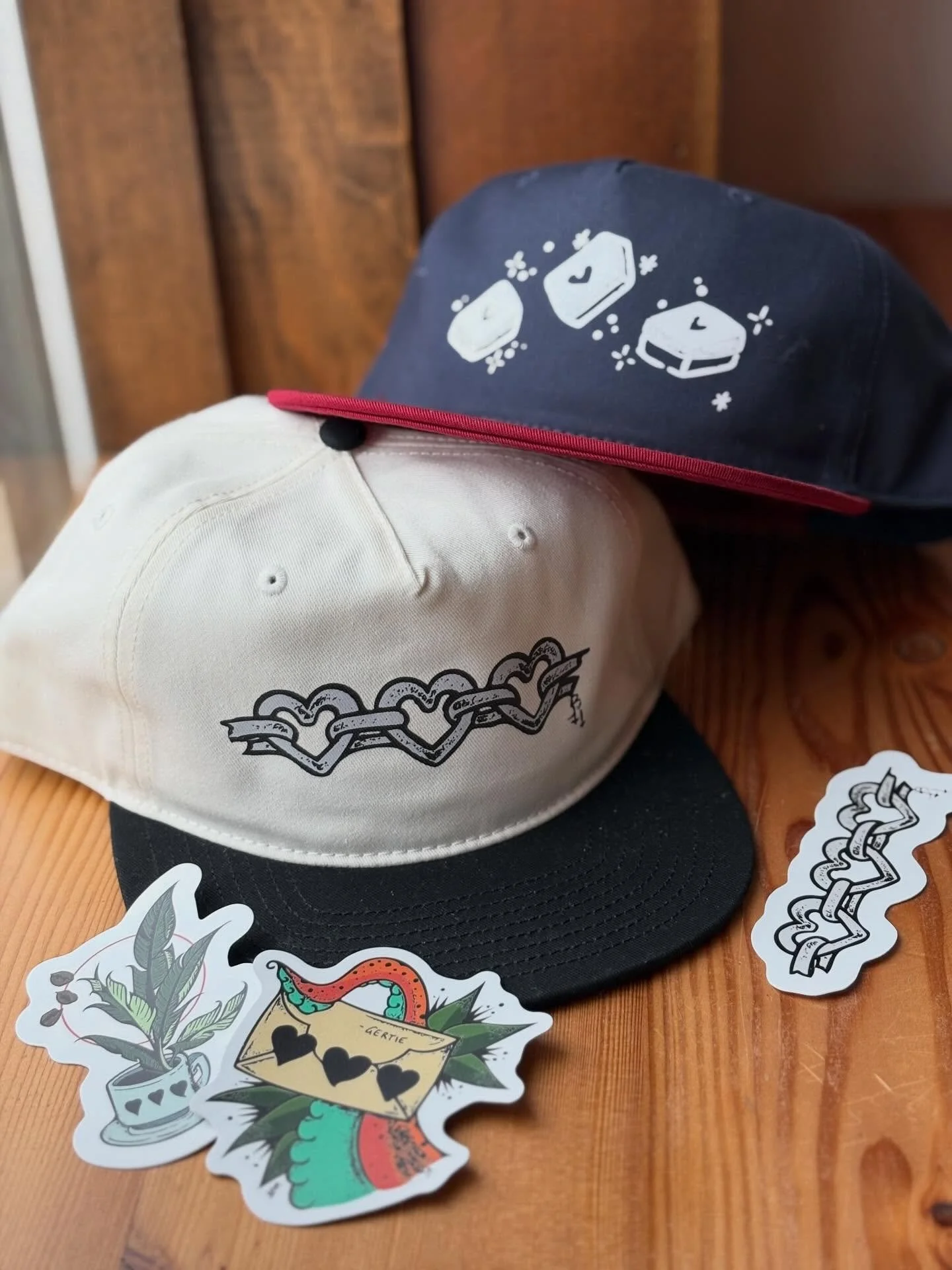 Our amazingly talented friend and artist, Brooklyn (@bones.keeper), created these gorgeous designs for us, which we&rsquo;ve since immortalized on hats and stickers. Get one before they&rsquo;re gone!

Thank you, Brooklyn, we couldn&rsquo;t love them