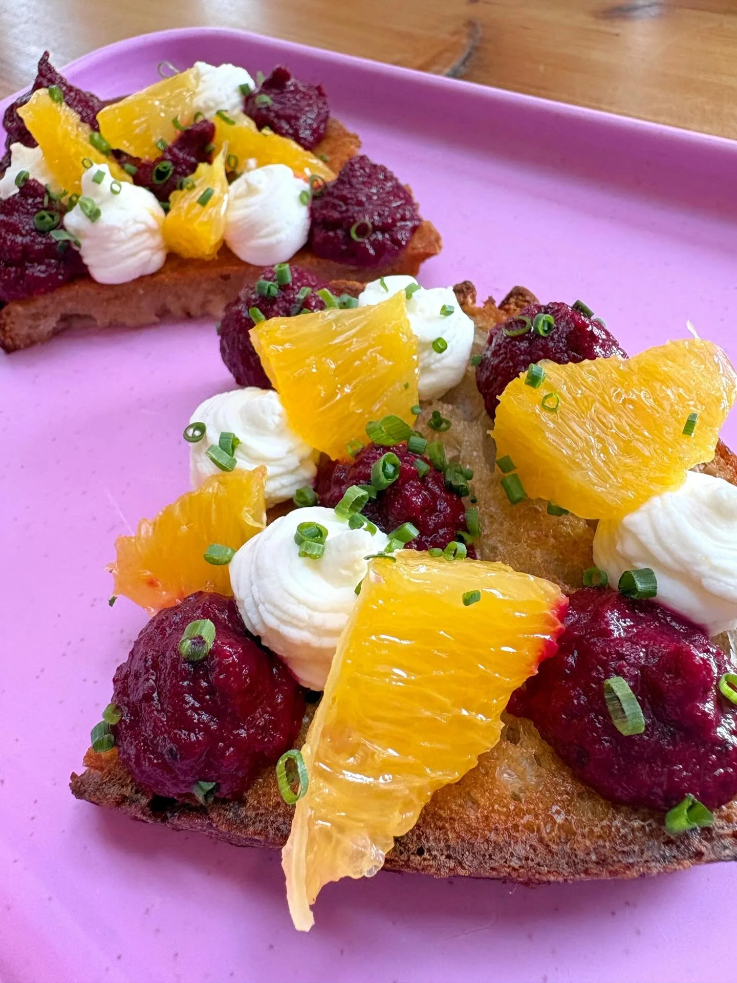 Another item new to the spring menu&mdash;beet toast! Whipped cr&egrave;me fraiche, segmented oranges, and pistachio beet mash, sprinkled with chives and served up on our house sourdough. Savory, sweet, earthy, and so so yummy. ❤️🧡💜