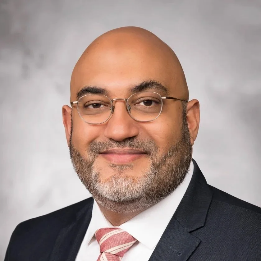 A professional headshot of Dr. Kashif Siddiqi.