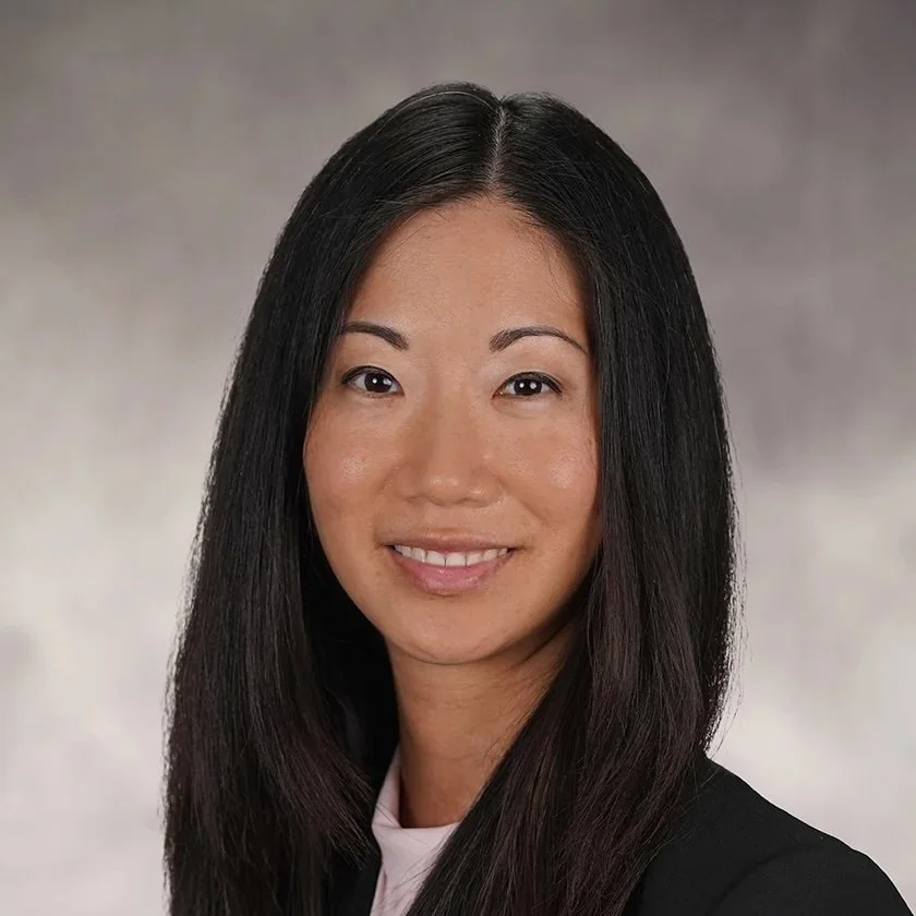 A professional headshot of Dr. Jennifer Kuo.