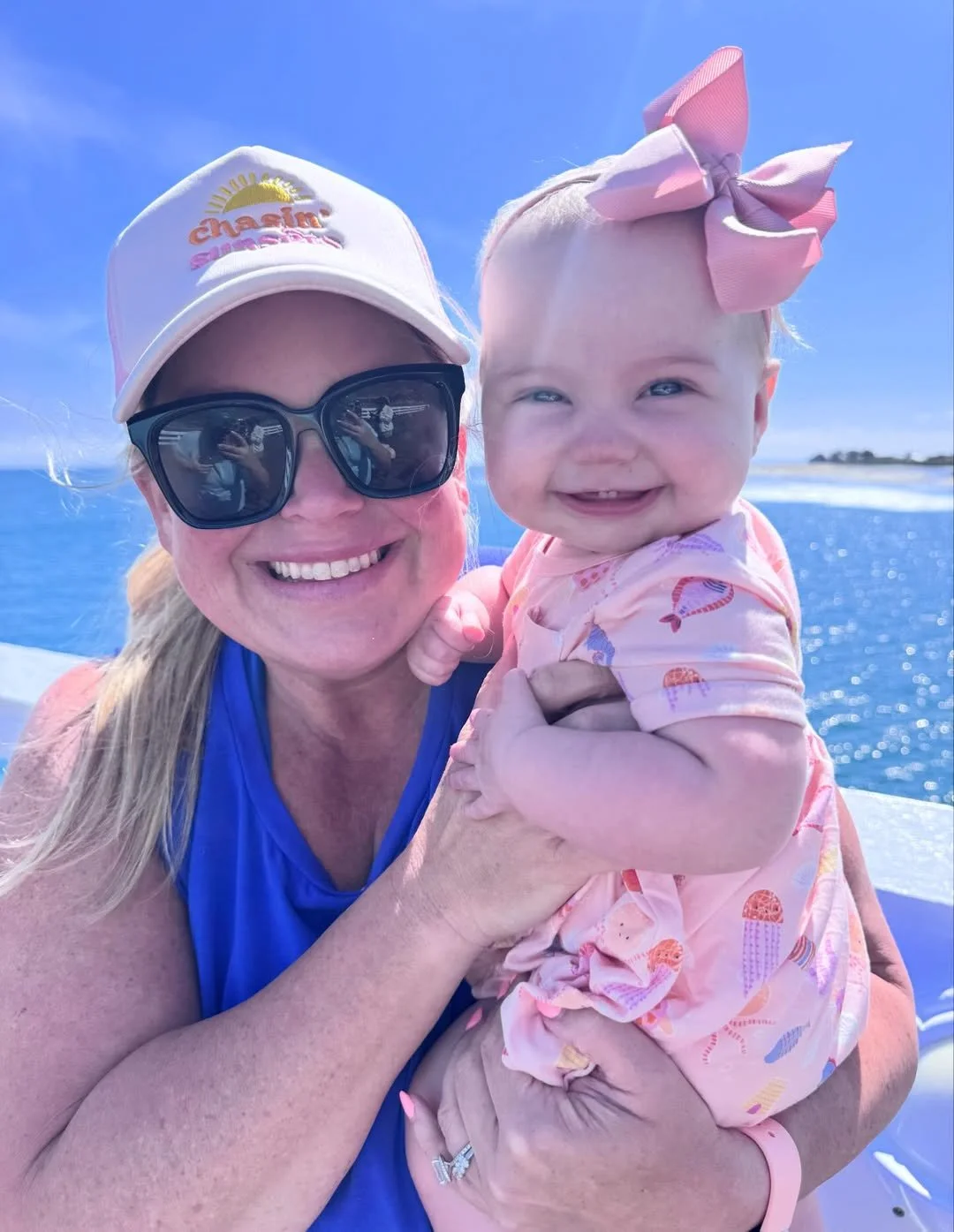 amy-boland-hauser-mom-baby-girl-pink-bow-ocean-malibu-ca.jpg