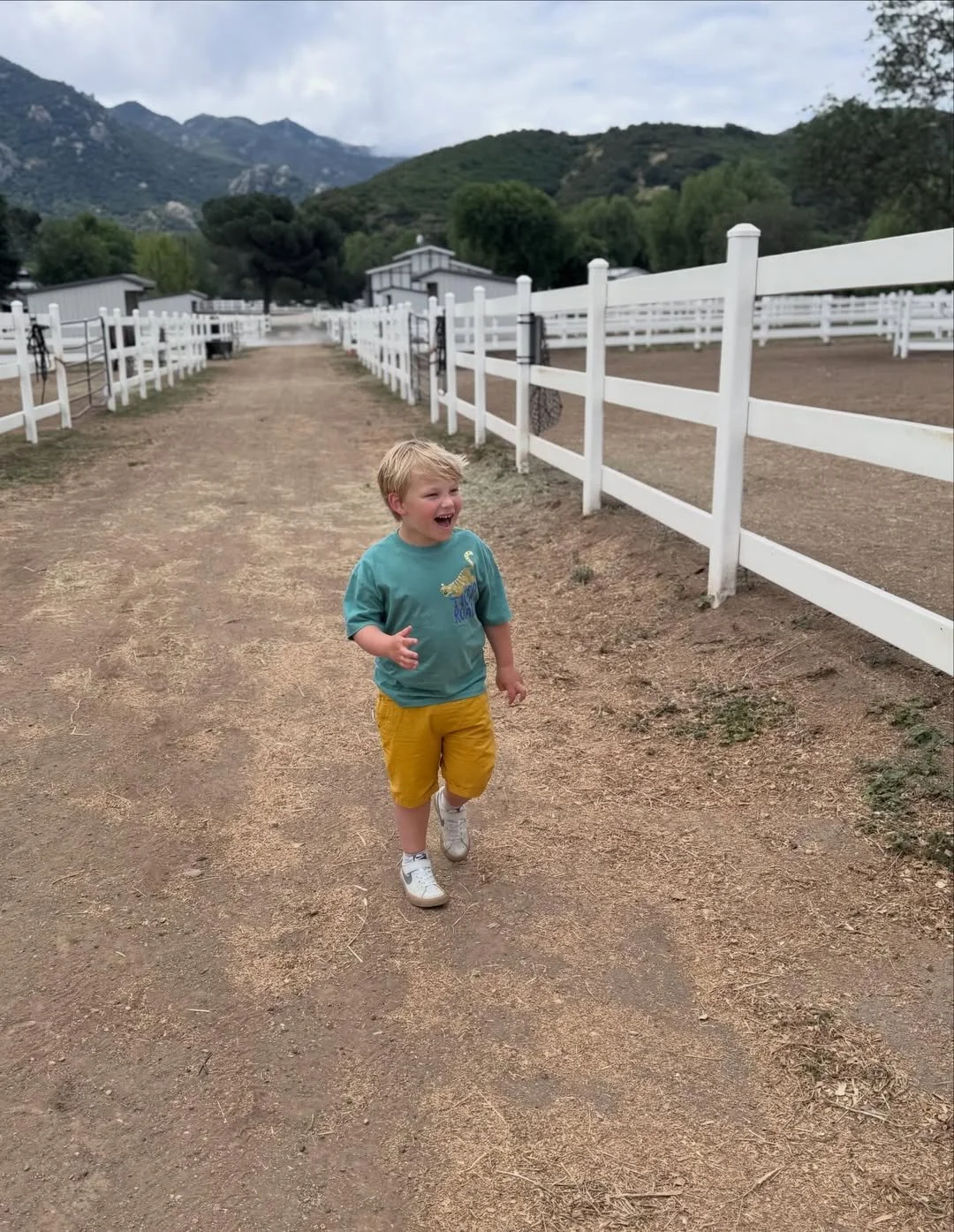 amy-boland-hauser-toddler-running-horse-ranch-white-fences-malibu-ca.jpg