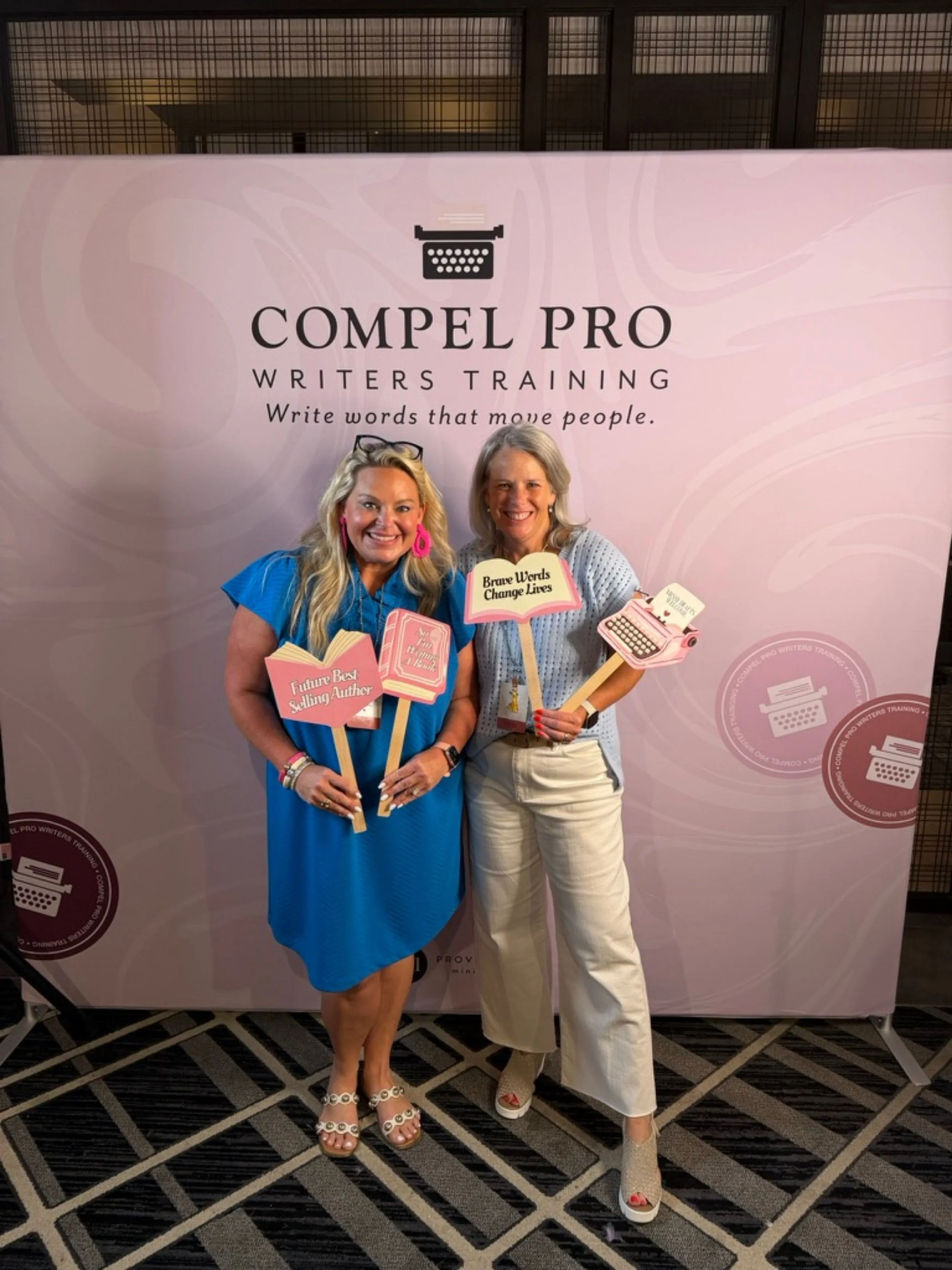 amy-boland-hauser-friend-compel-pro-sign-props