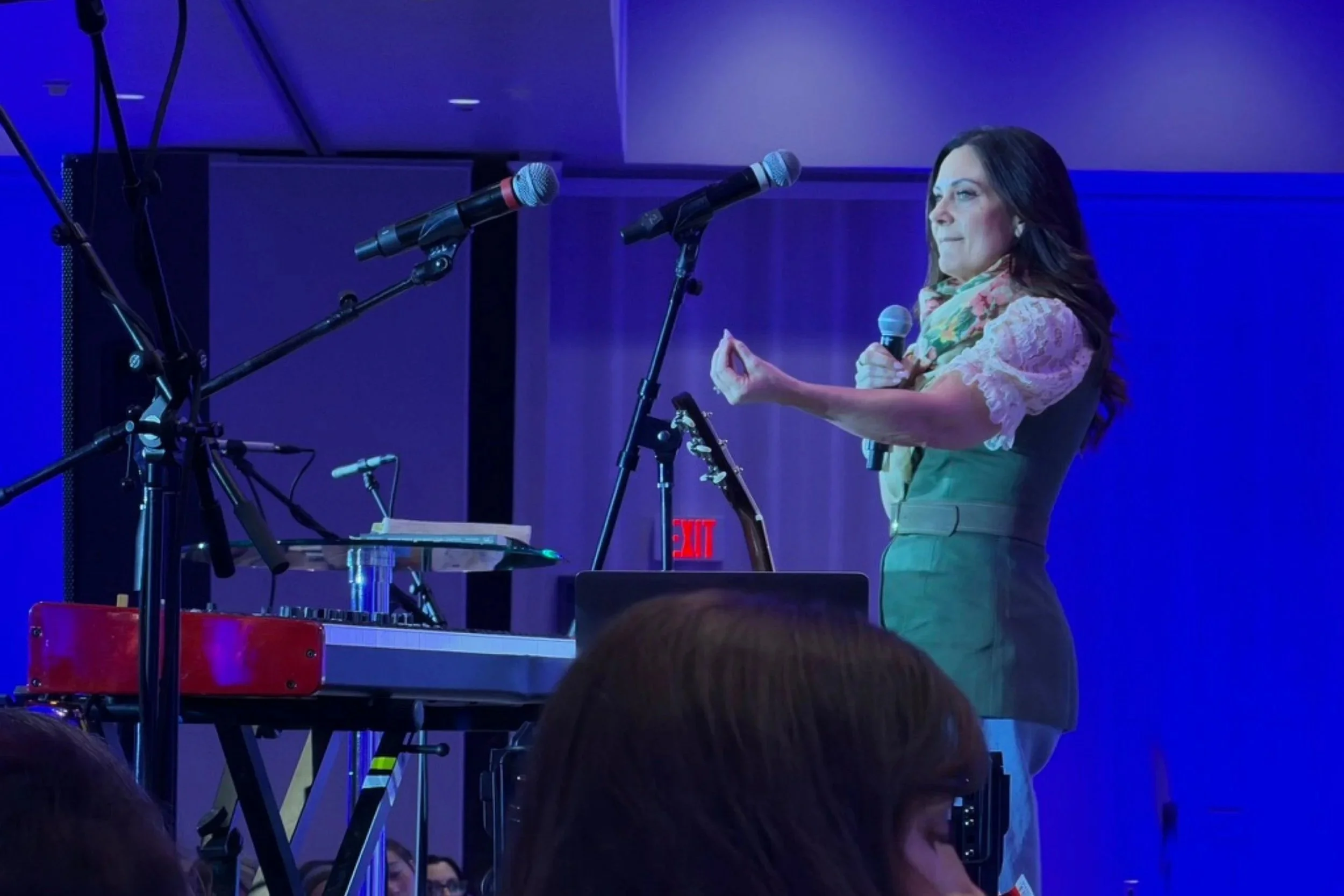 she-speaks-conference-speaker-on-stage