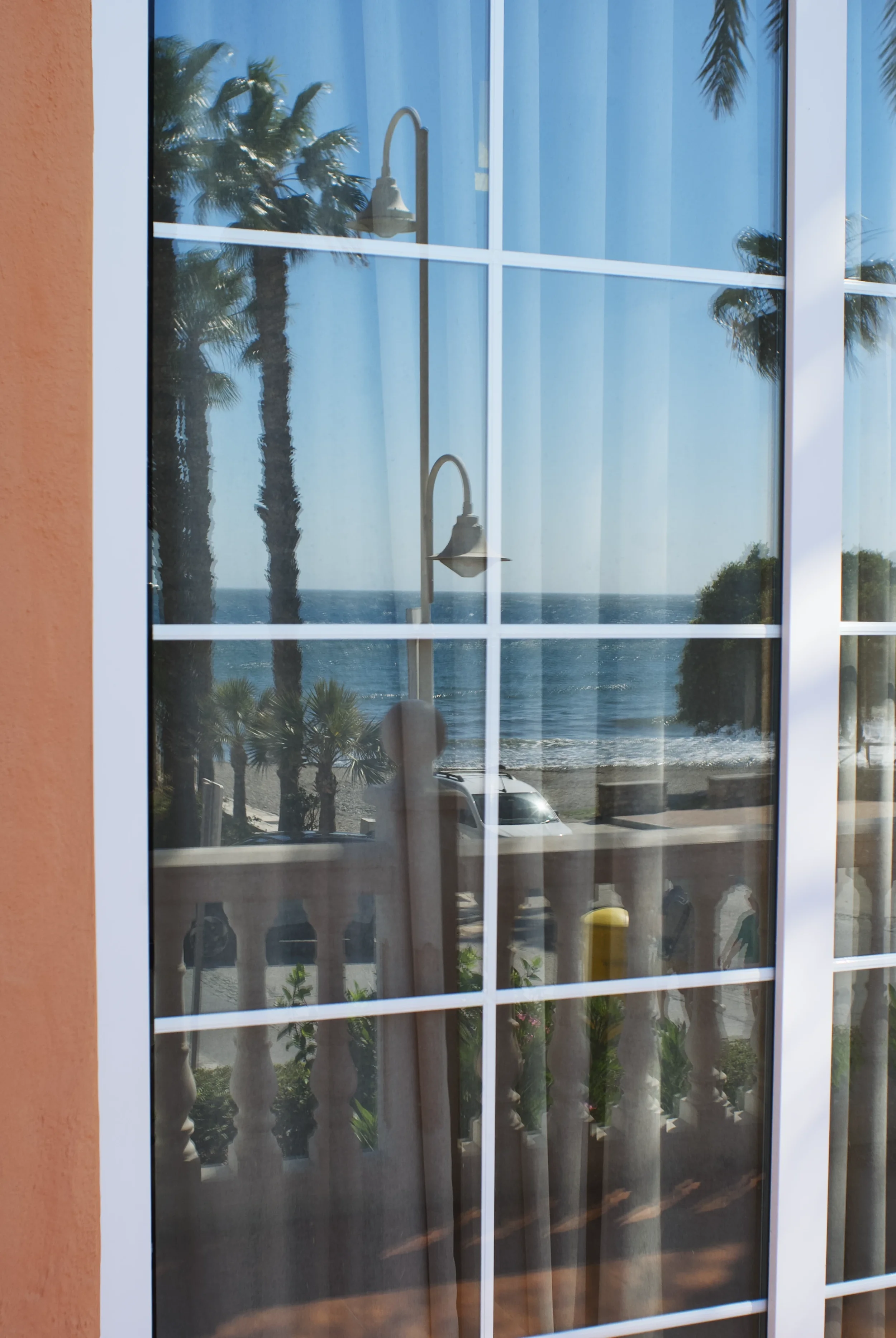 reflection_beach_window.webp