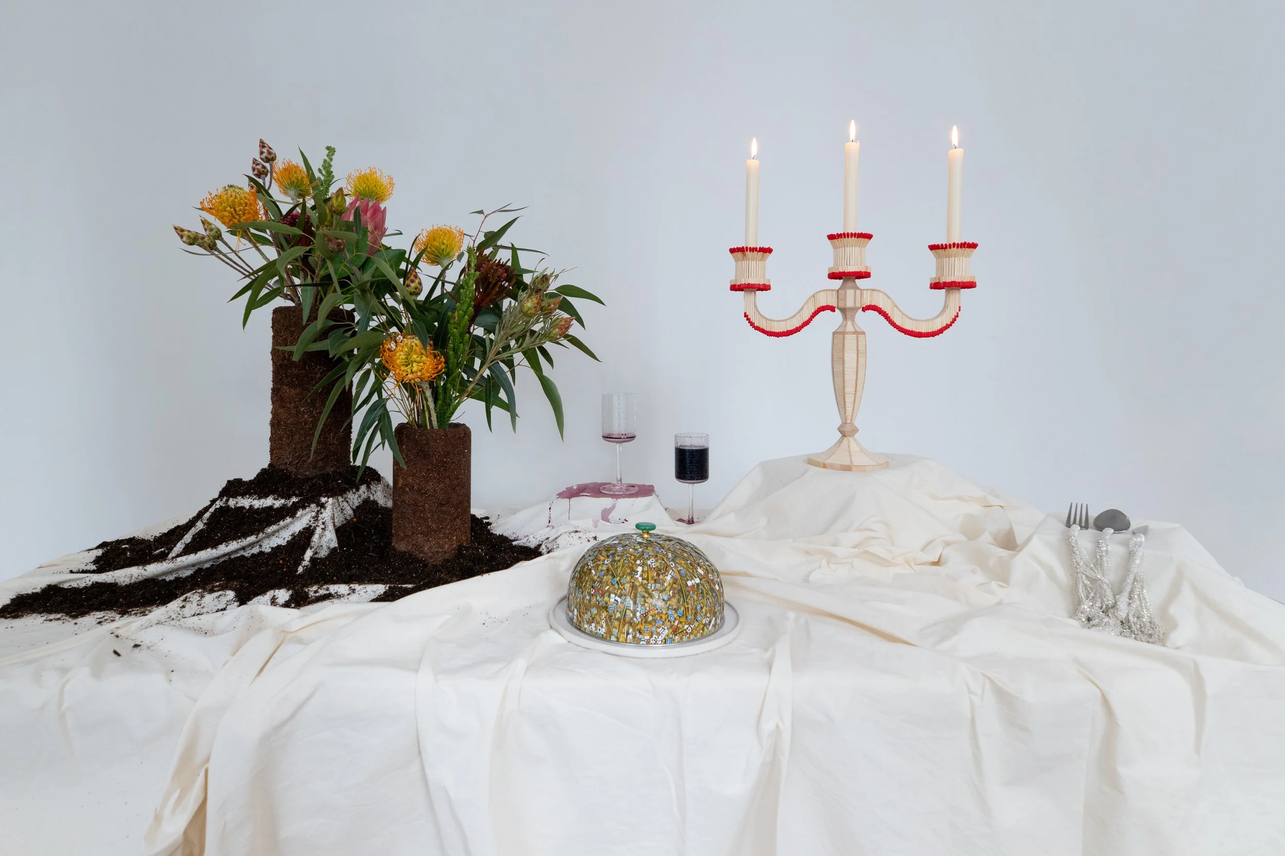 Installation view of the a banquetting table display produced by artist Elaheh Ganji for her exhibition From Matter to Emotion, From Emotion to Matter