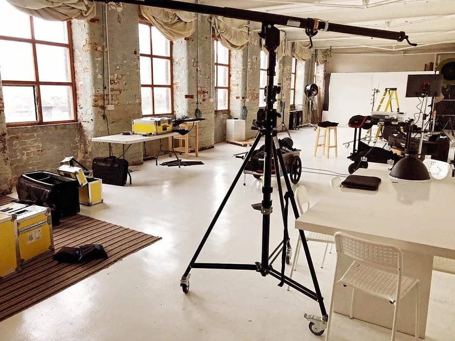 Mega boom arm and lighting stands set up in the Belfast Studio Rental daylight studio