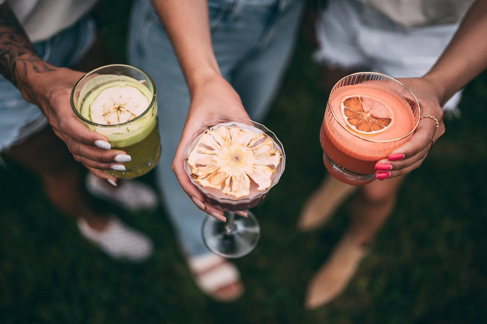 Happy customers enjoying drinks at a mobile bar