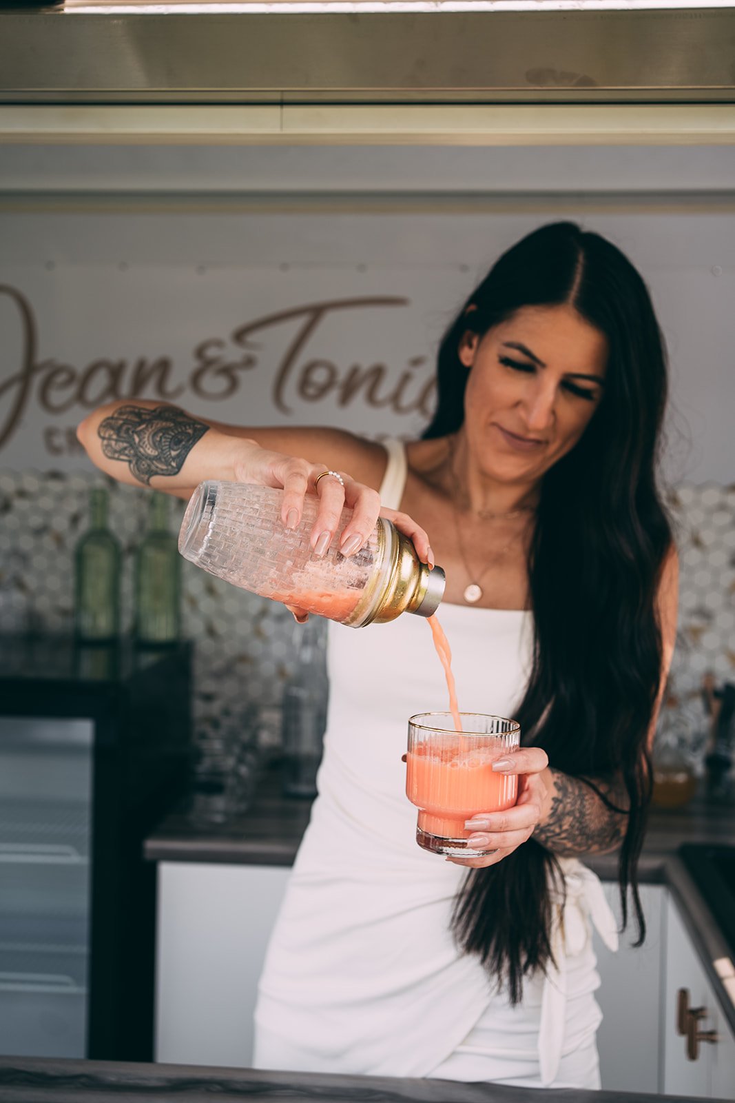 Professional bartenders preparing delicious cocktails