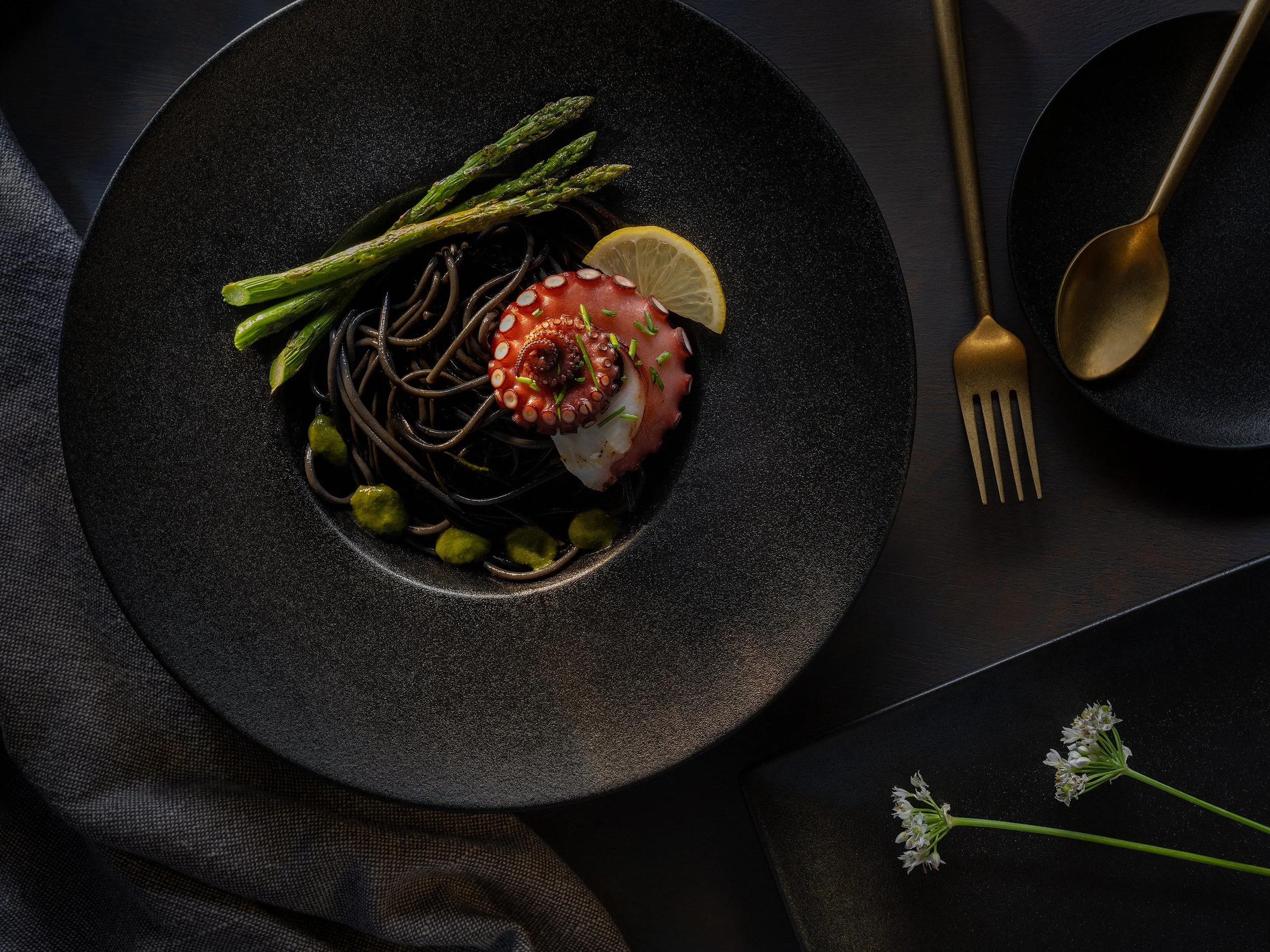 Octopus on Black Pasta