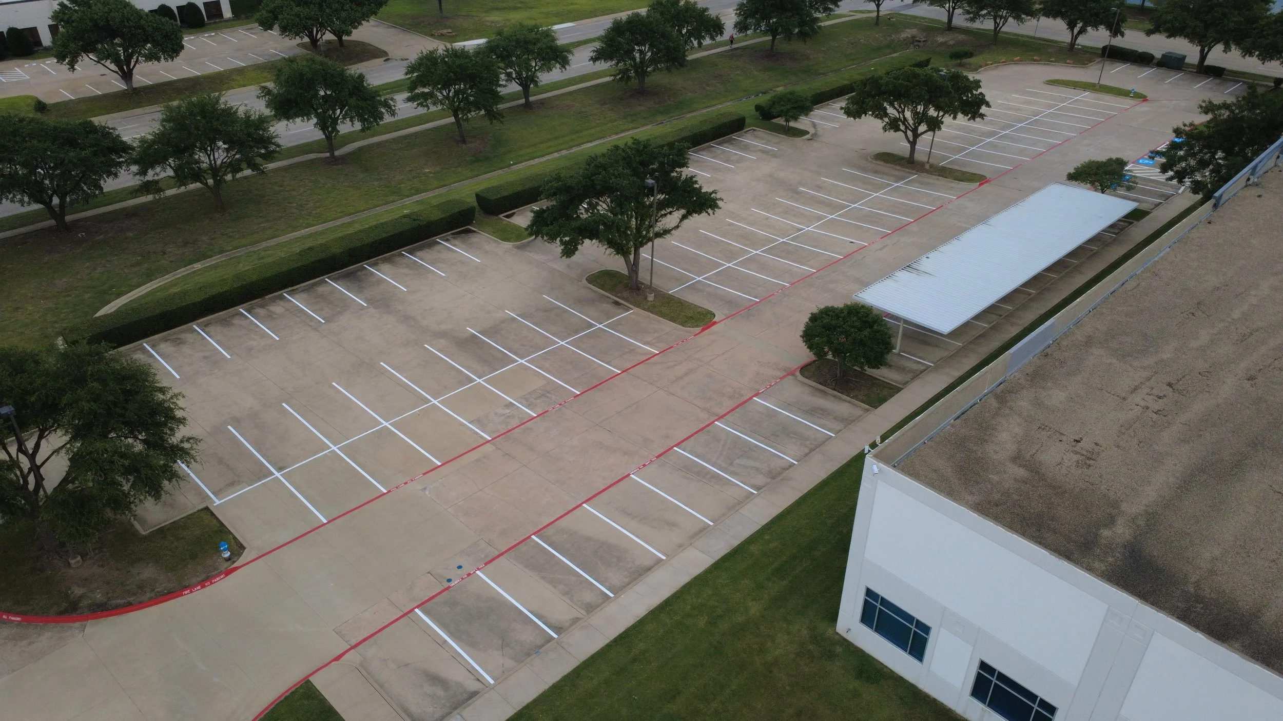 Faded parking lot lines restored with professional restriping in Dallas-Fort Worth