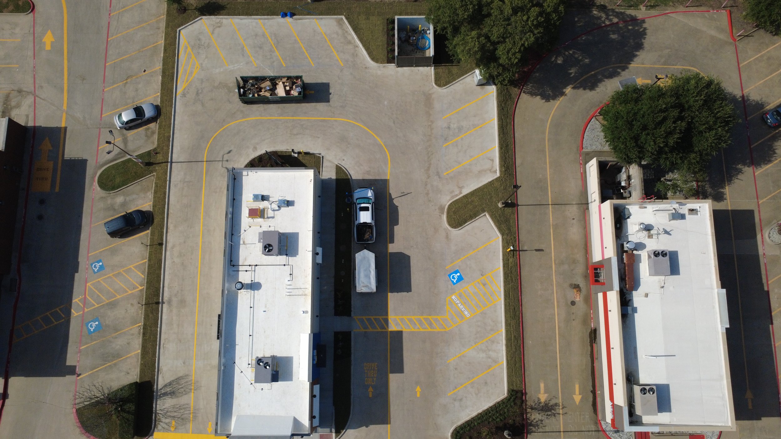 New parking lot striping with parking stalls and ADA markings in Dallas-Fort Worth