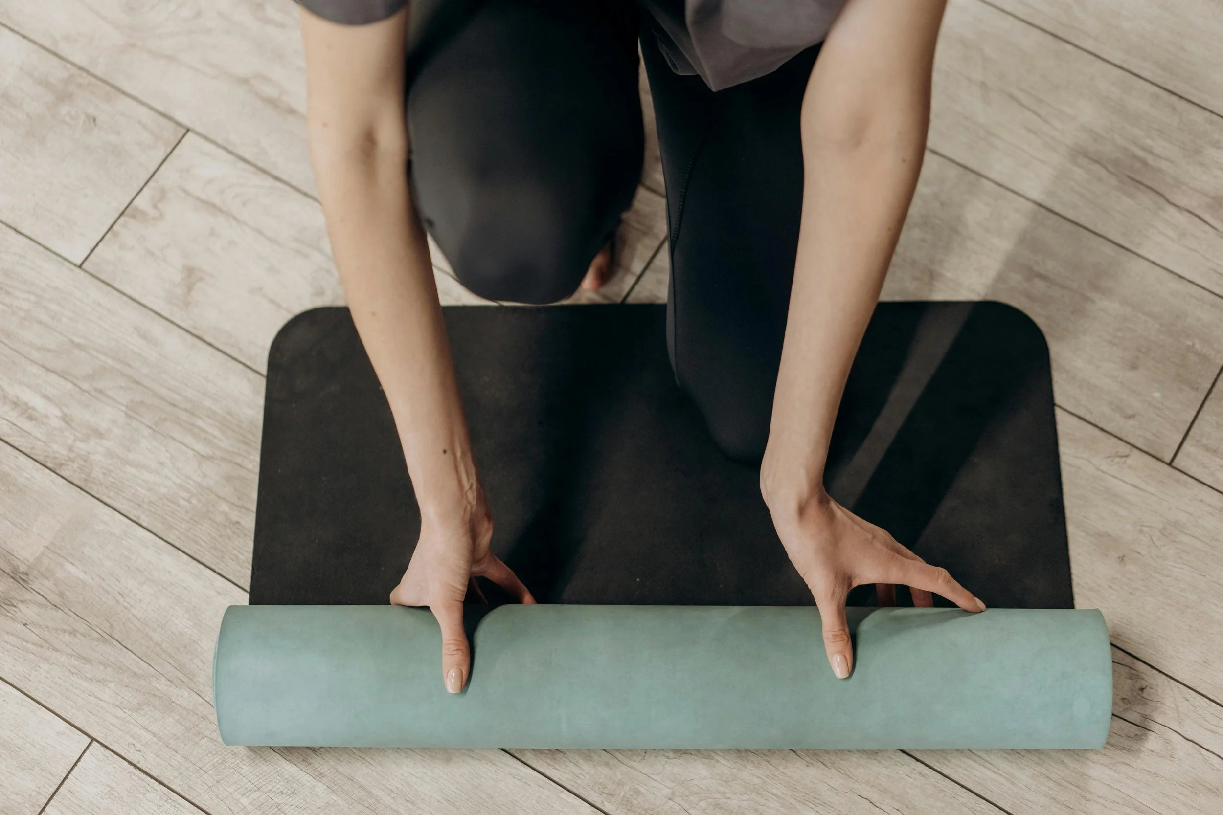 woman on a yoga mat in a pose