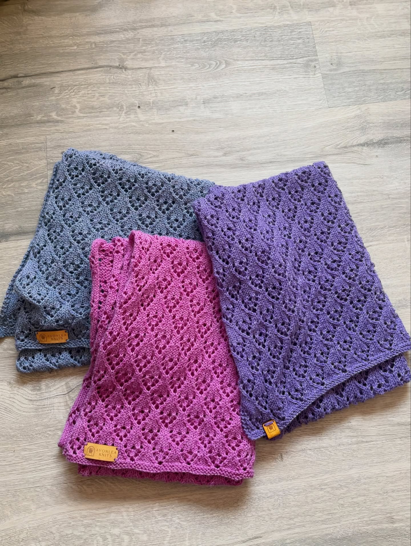 3 Wrapped in Love Shawls for 3 special children! Made with lots of love. The Wrapped in Love pattern is a forever free pattern on all platforms where my patterns are sold. #avonleaknits #wrappedinlovedshawl #prayershawl