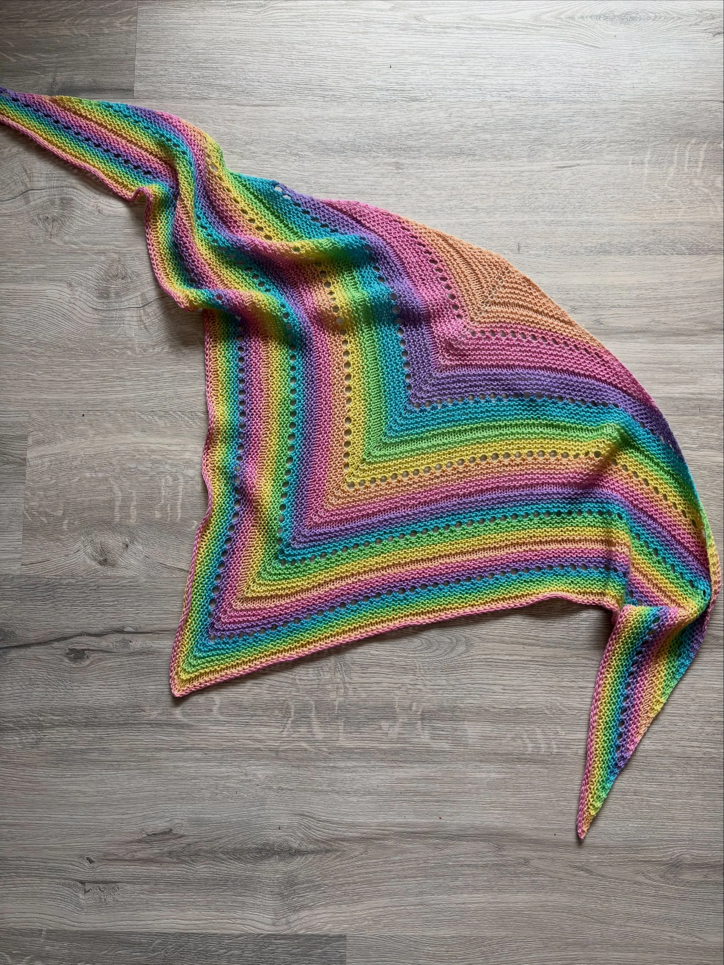 The Lakeside Shawl. A simple, top down triangle pattern that is easy to memorize. 

This is the prefect pattern to showcase that hand-dyed yarn you have in your stash, or when you need a project to quiet your mind. A great knit for those summer trips
