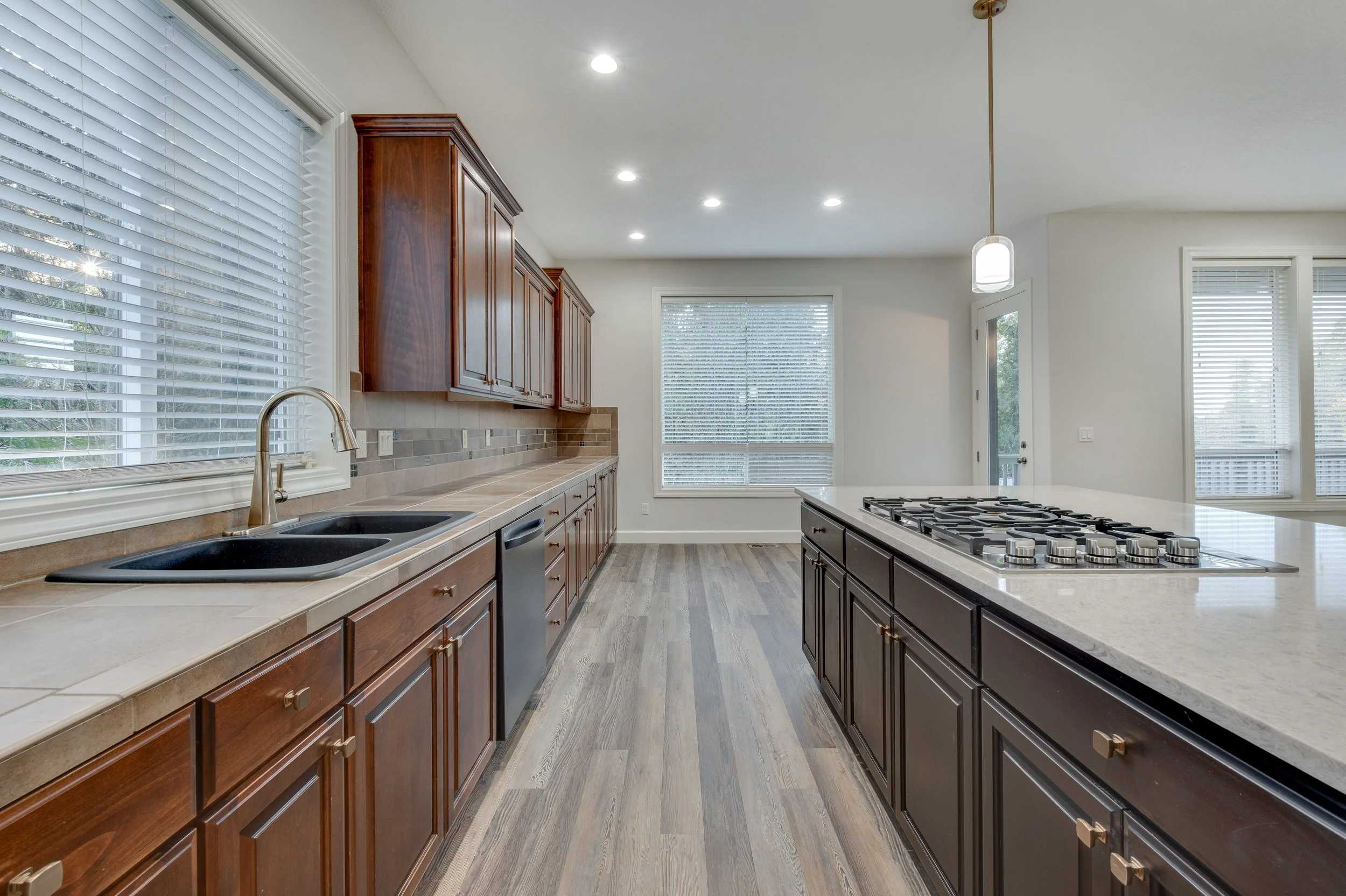 5 - Kitchen to Dining w Cooktop.jpg