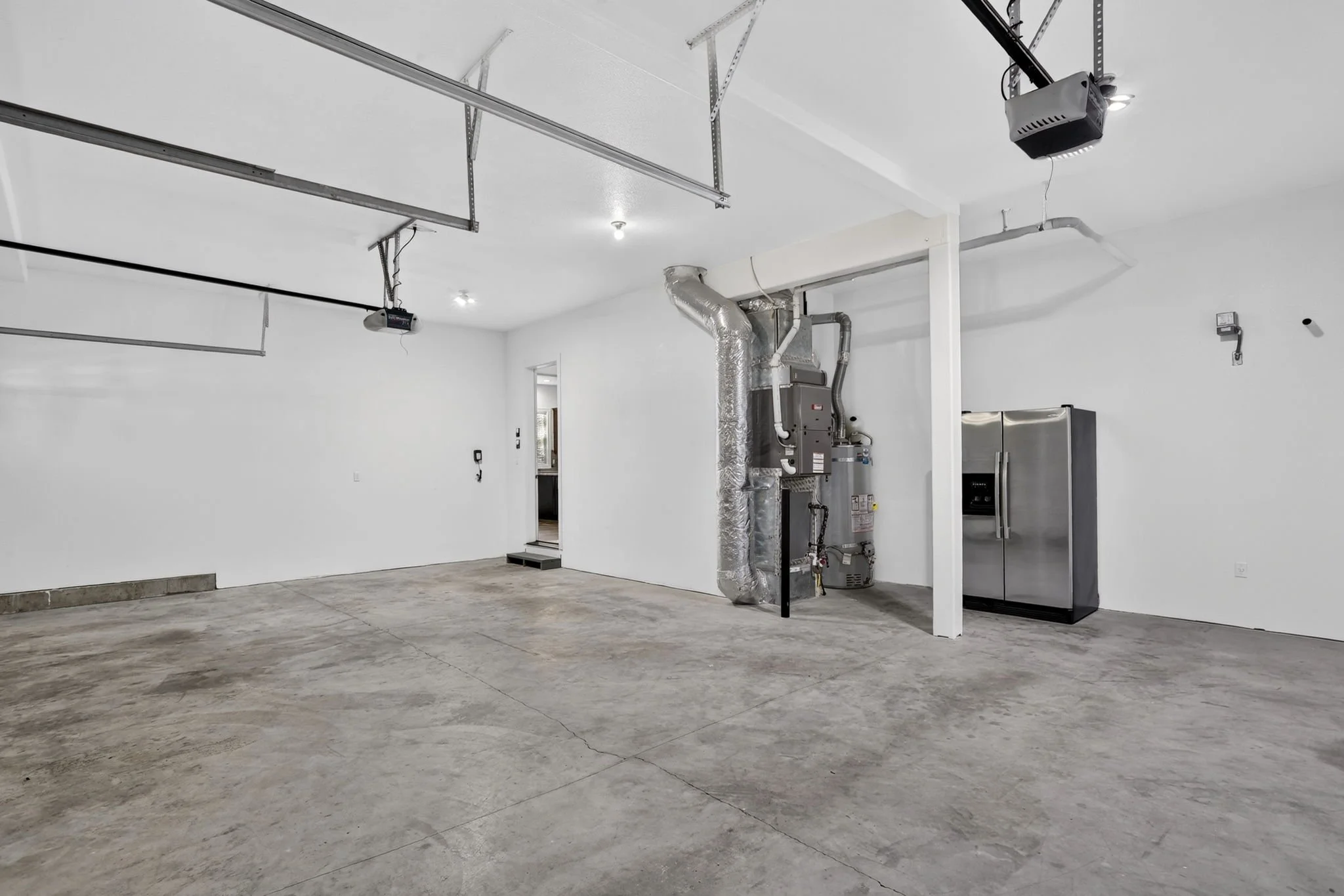 11368 NW Pumpkin Ct - New Furnace, Water Heater + Extra Refrigerator