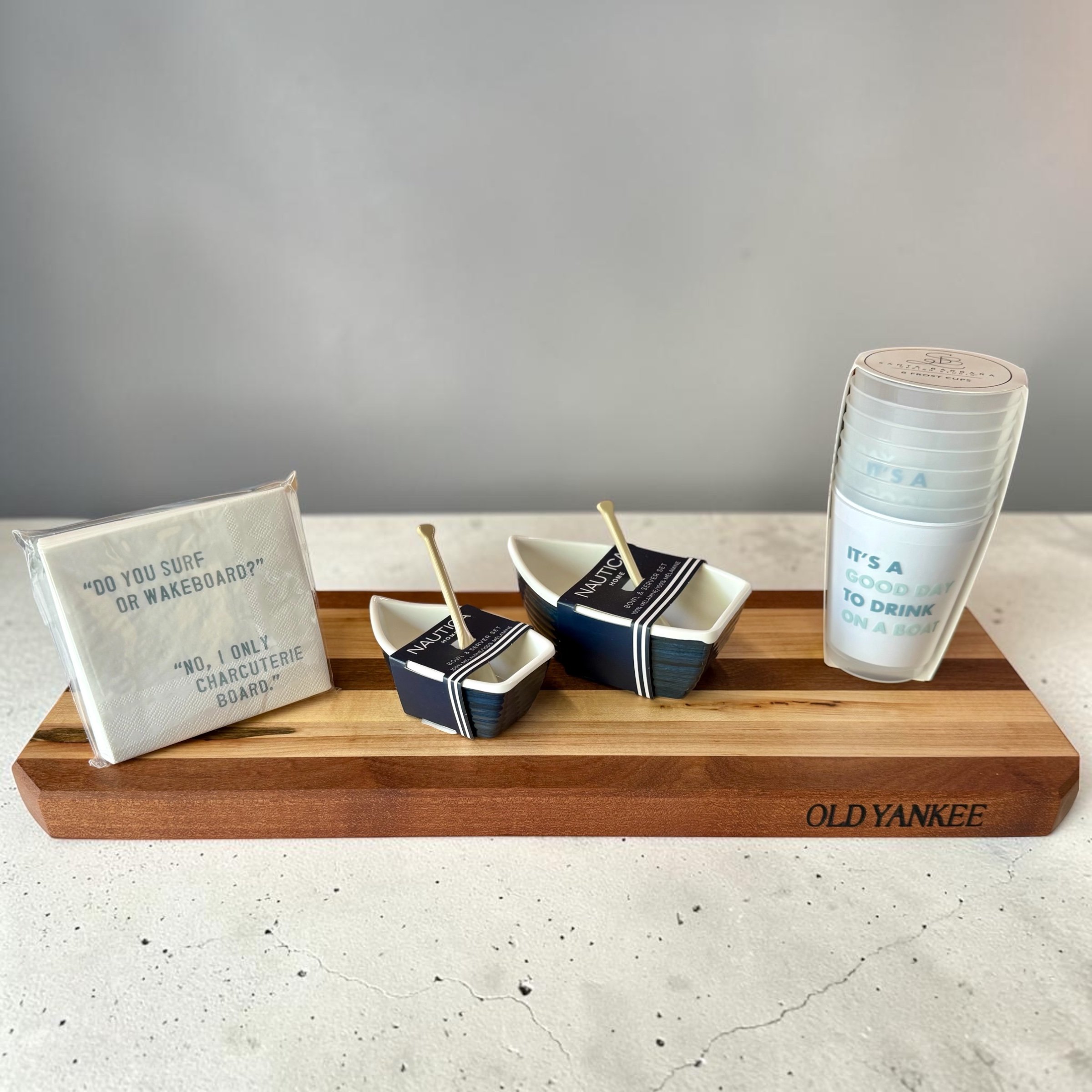 Mahogany and maple stripe board with large worm hole