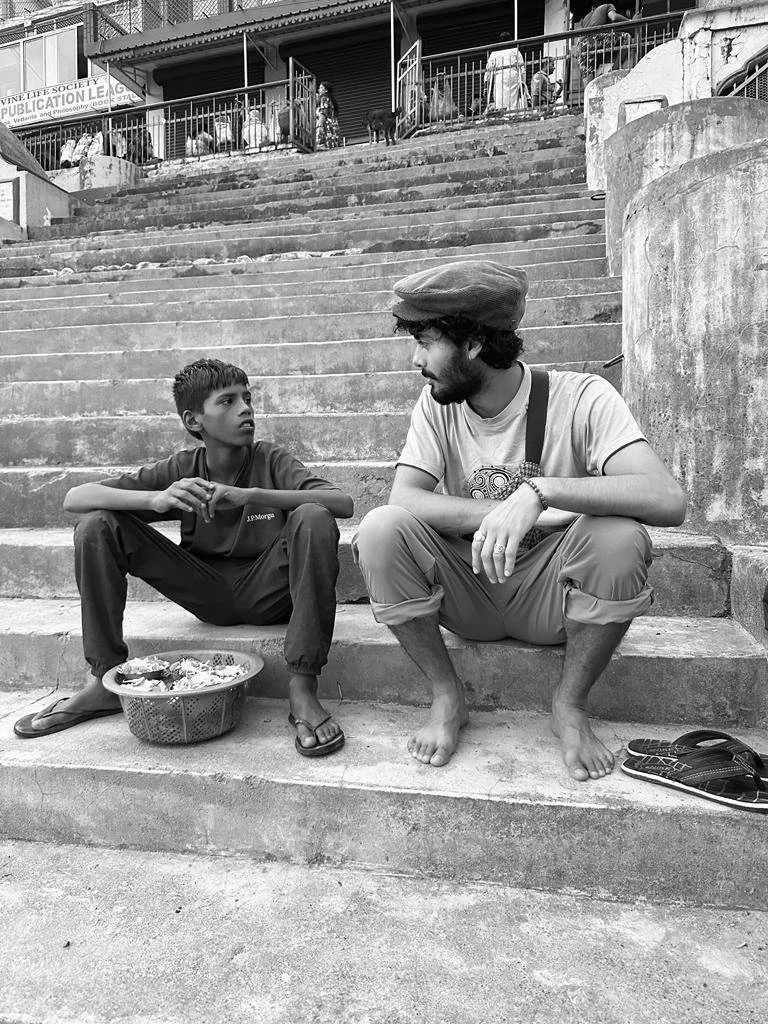 Jesse Connally teaching Vedic Meditation in Melbourne - calm, natural setting by the water on steps