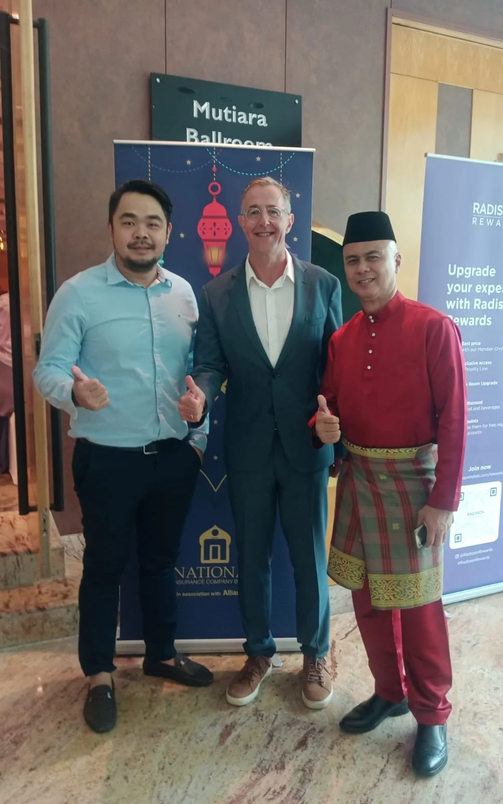 With Mr Klaus Tomalla GM of National Insurance Company Berhad
