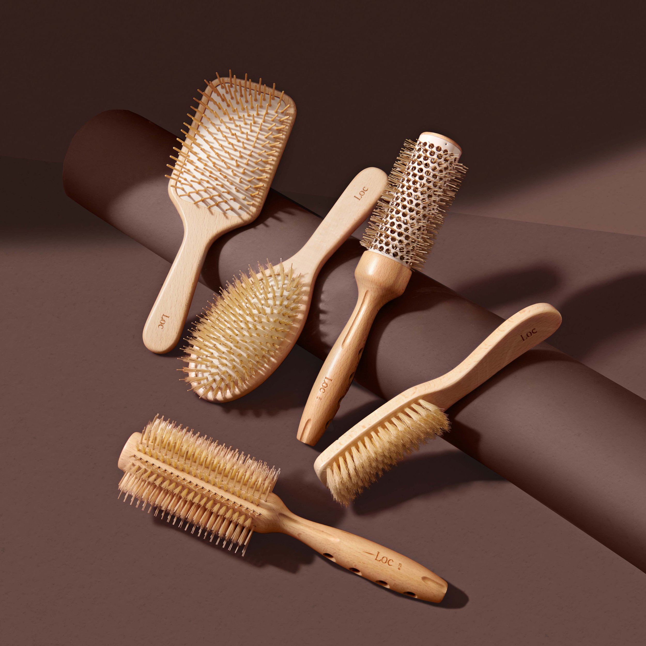 Loc-hairbrush-salon-product-photography-moody-lighting-australia-1.jpg