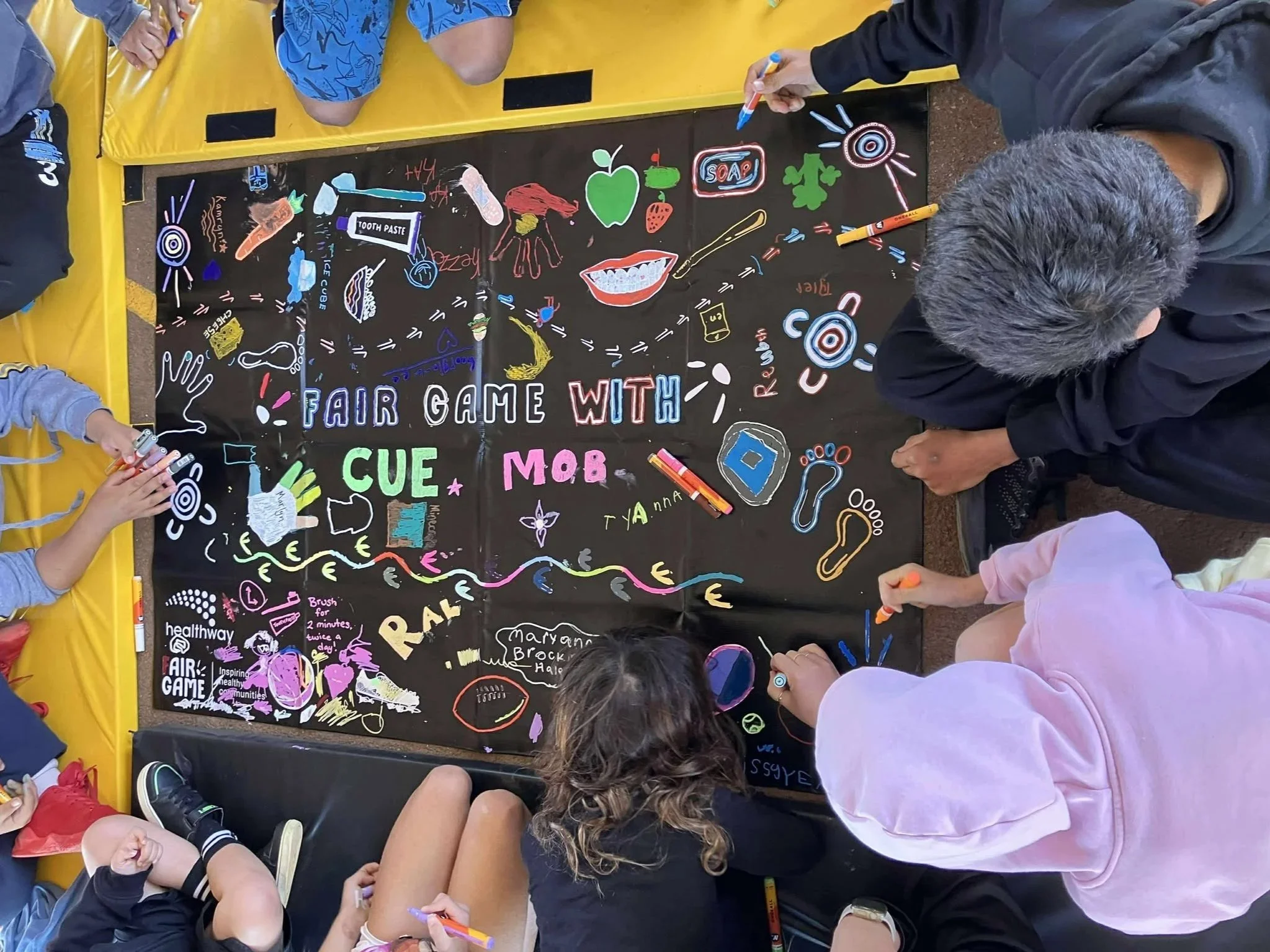 Yarning about healthy habits while we colour