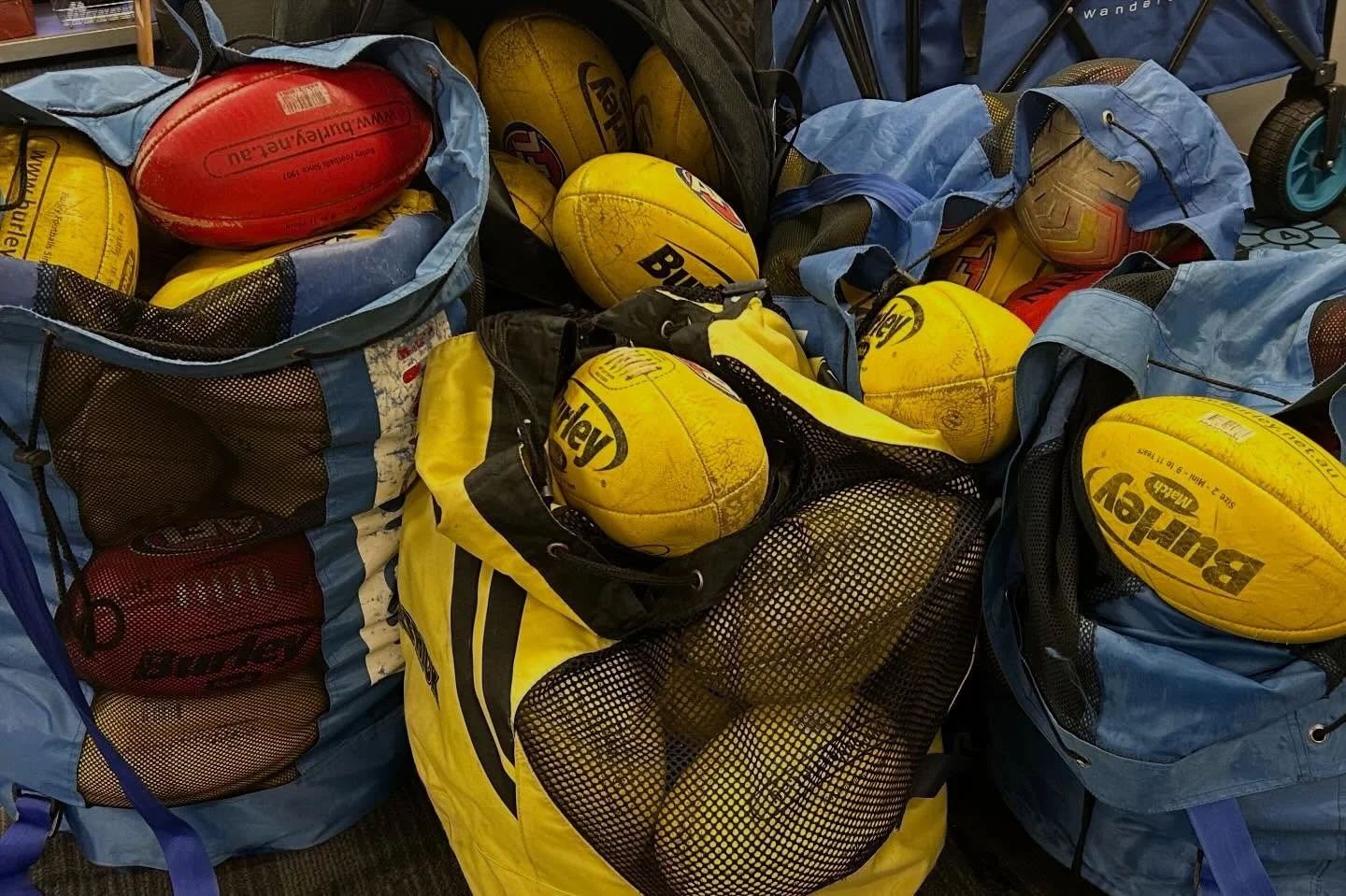 You can kick a footy in your back yard without a pair of boots or even barefoot - but you DO need a footy! 🏉 Thanks so much to @hammondparkjfc who, having had a stocktake at their clubhouse, realised they had a heap of balls still in good condition 