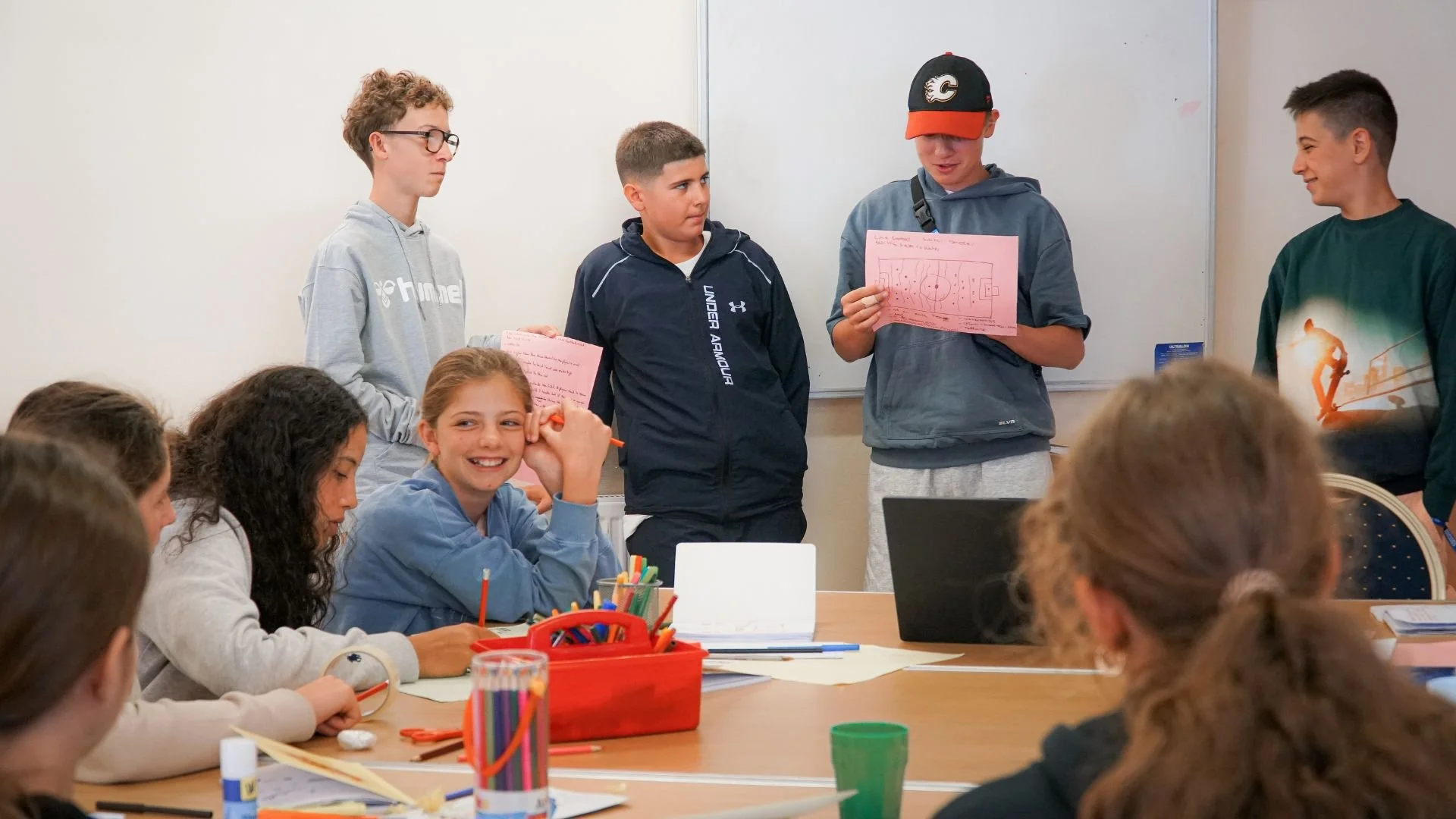 Our international students in their morning English lessons doing a fun activity as a group.