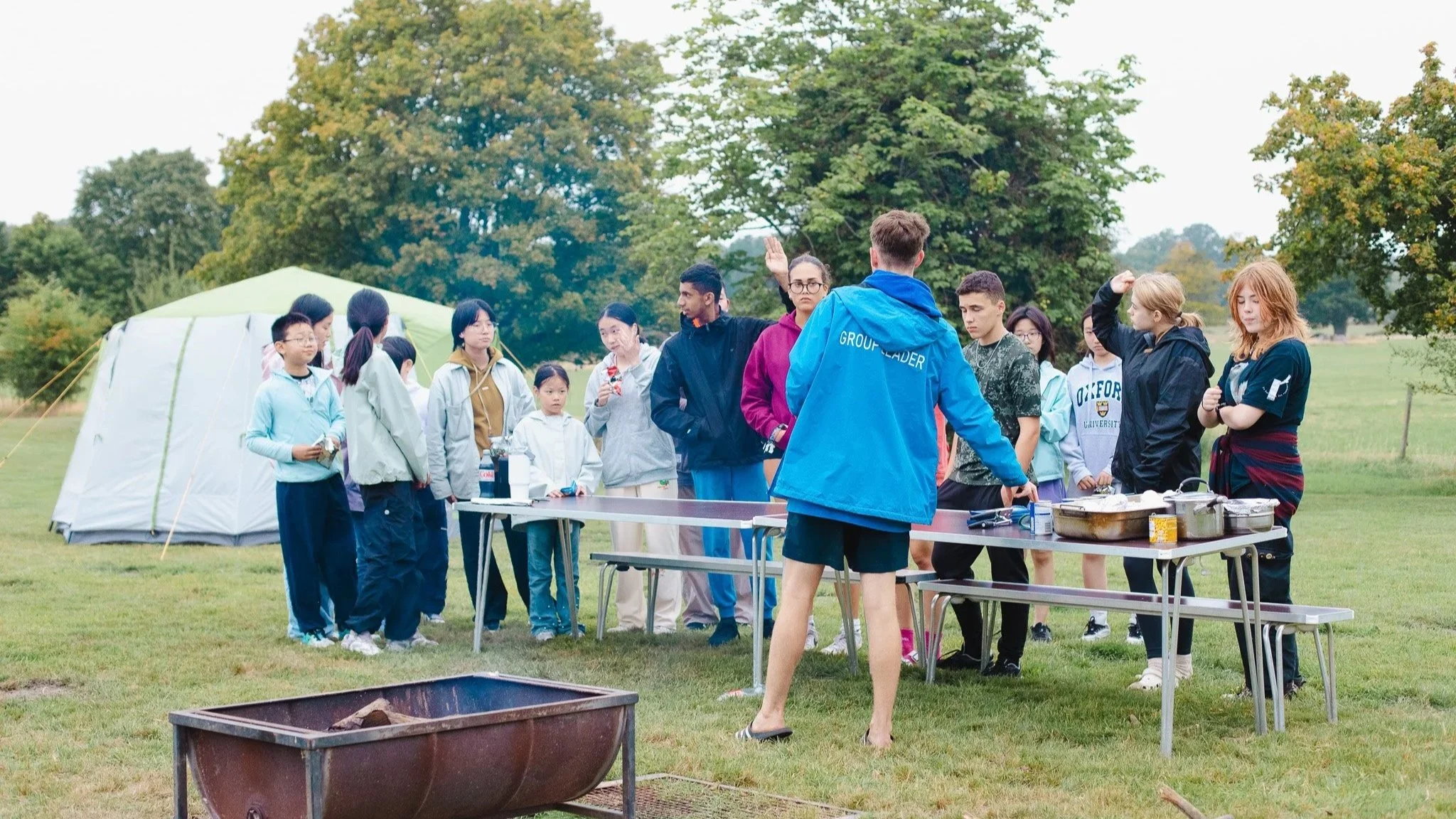 Children listening to a safety briefing before adventure activities