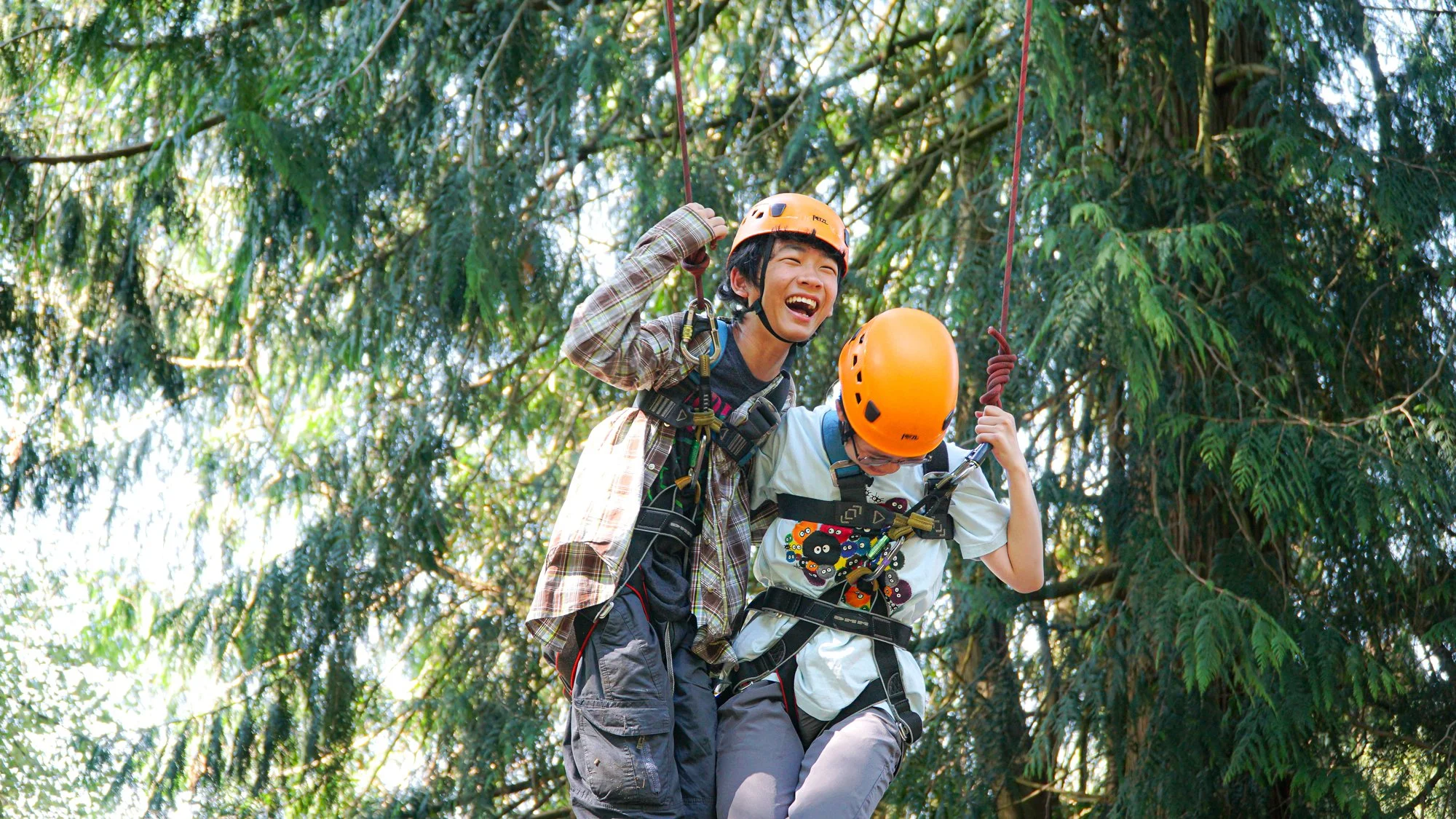 Kids and teens mountain biking in the Forest on a Residential Summer Adventure Camp in the UK