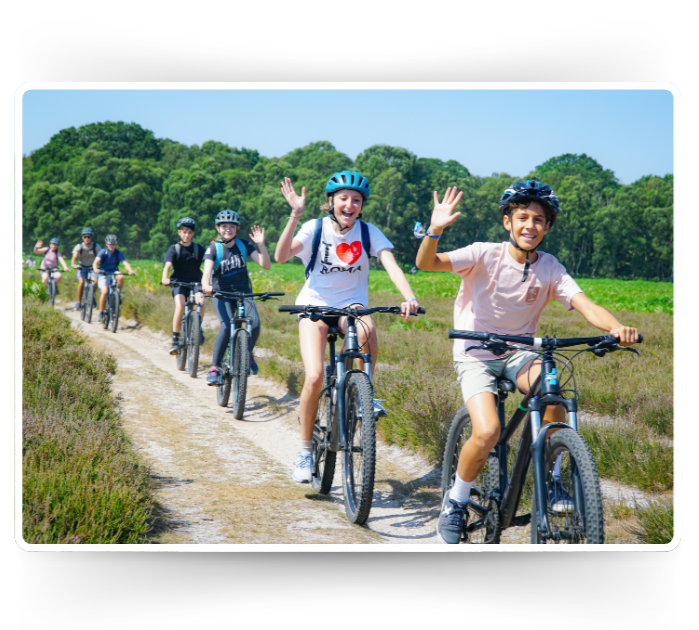 Teens mountain biking through the New Forest on our Summer New Forest Adventure Camp.