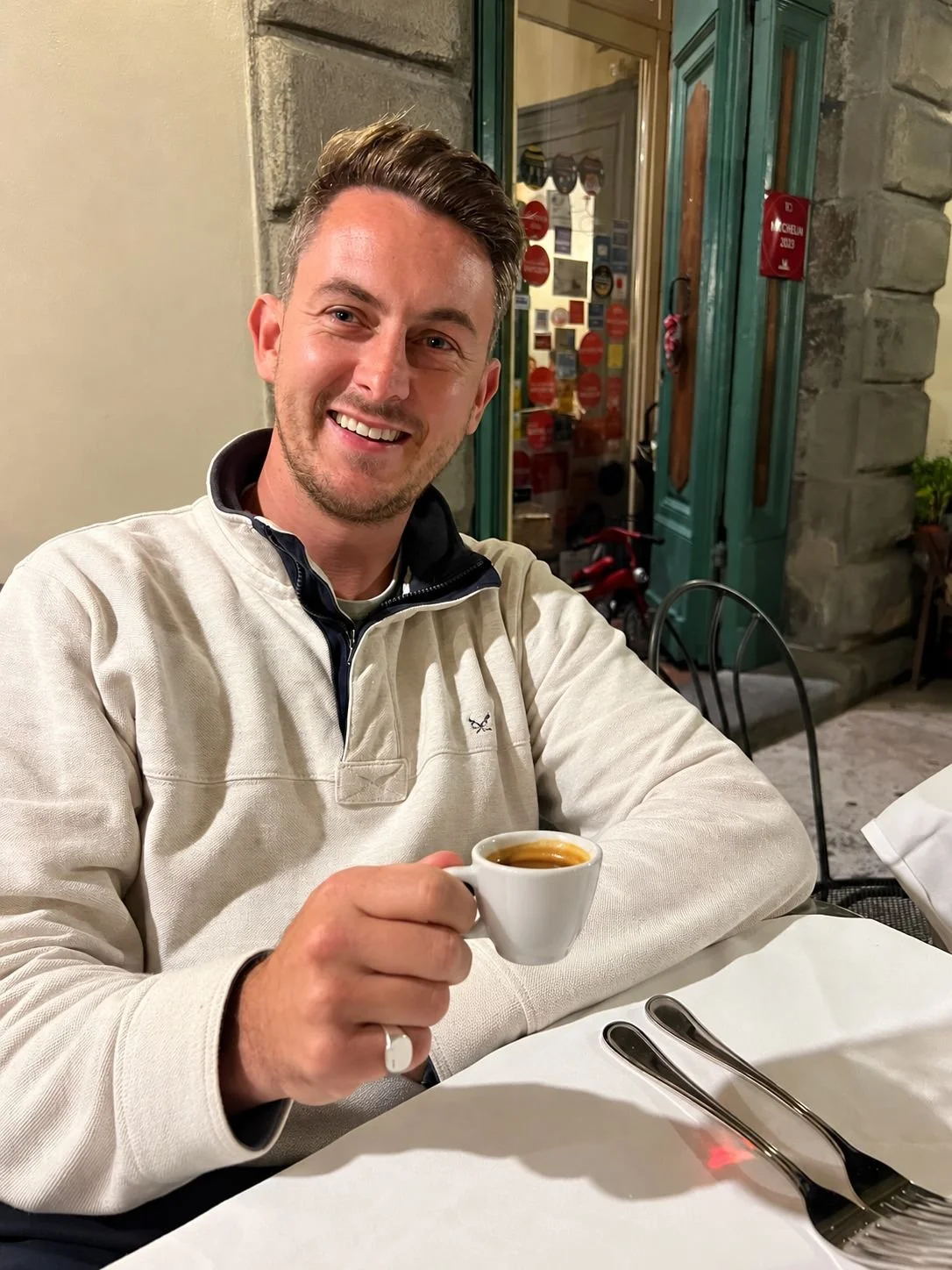 Company Director Holding Espresso Discussing Not Going To ICEF