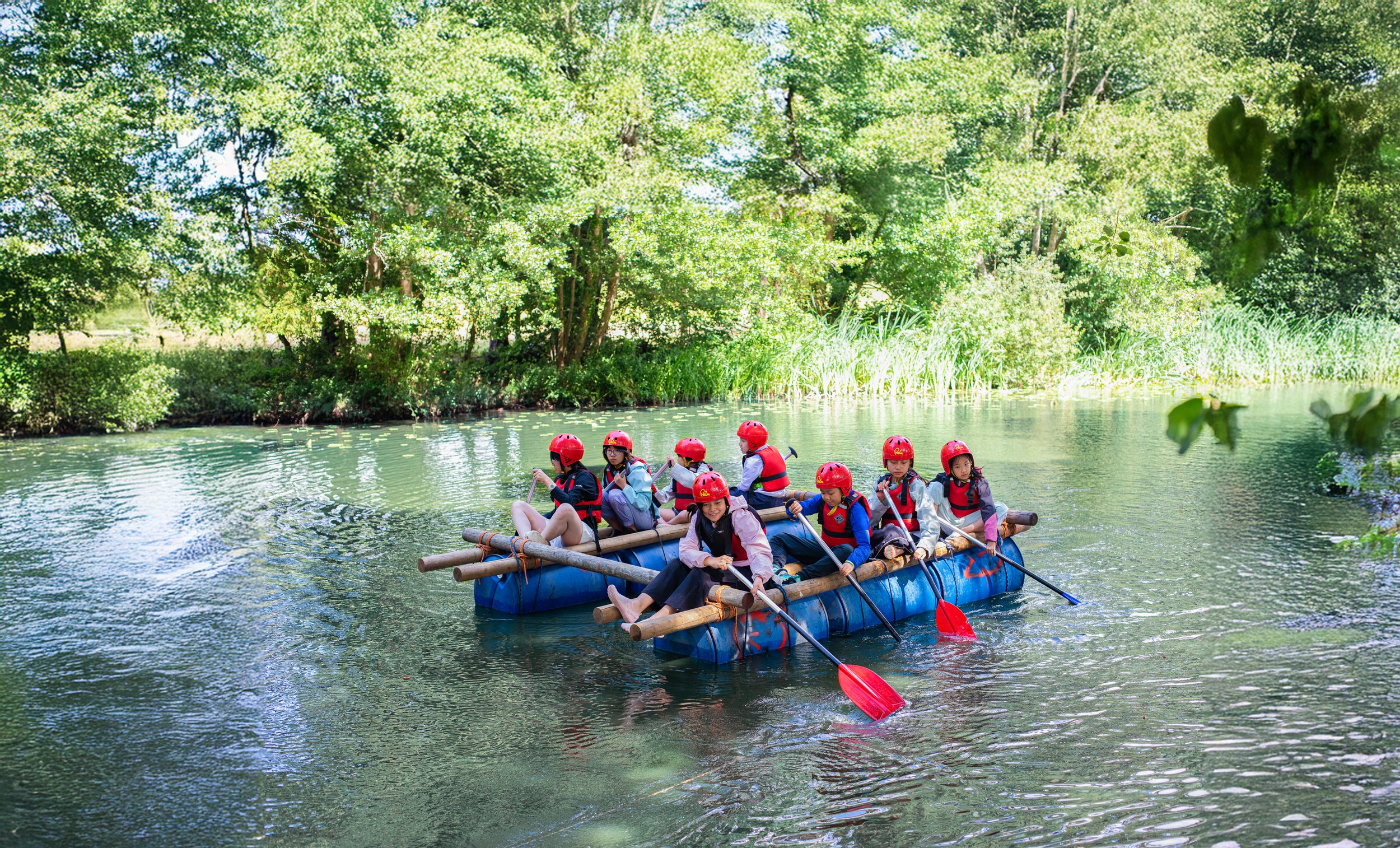 Children and teens on an English and Adventure Camp in the New Forest UK. They are putting English Language into practical/real-life use in adventure activities.