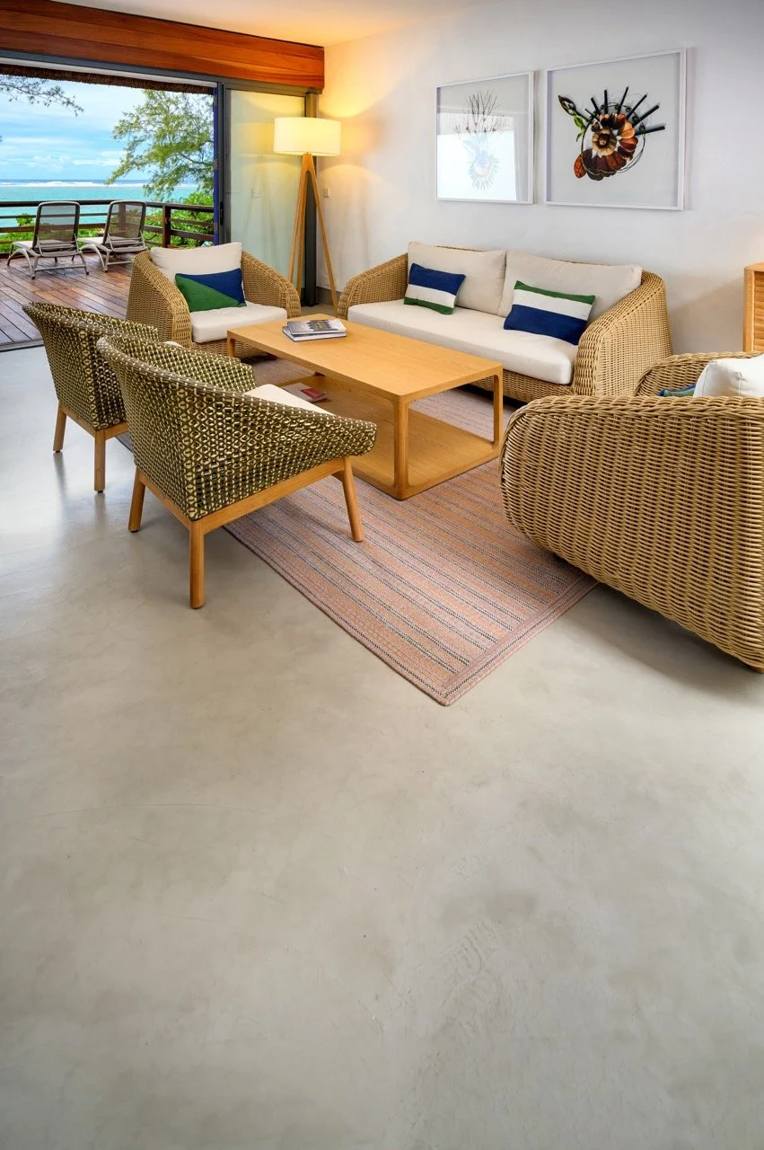 Living room finished in Cretecote Sand Dollar béton ciré by Cemtech Mauritius at Serenity Villa with coastal sea view
