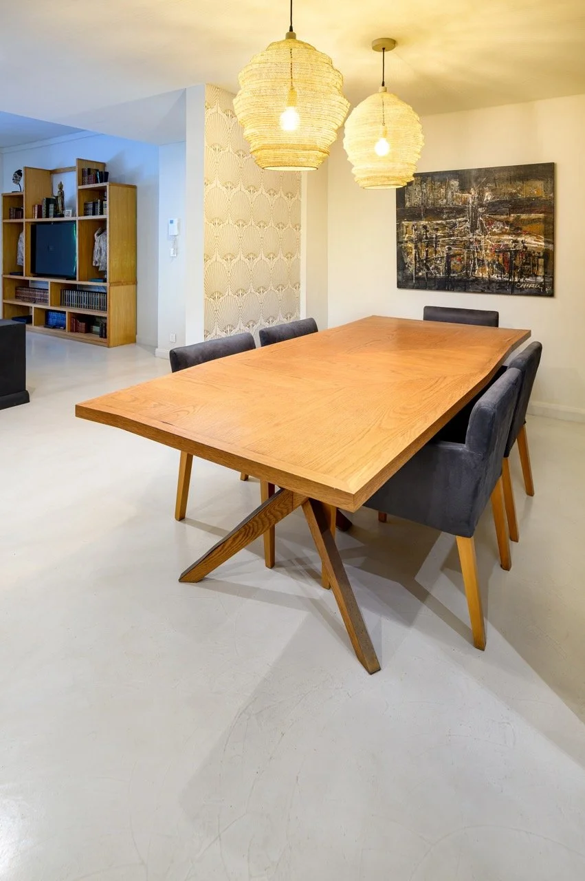 Refined dining room finished in Cretecote Light Bone béton ciré at Azuri Elegance by Cemtech Mauritius