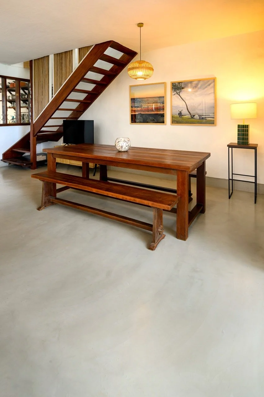 Breakfast area with Cretecote Sand Dollar béton ciré surfaces by Cemtech at Serenity Villa overlooking the coastal seaview