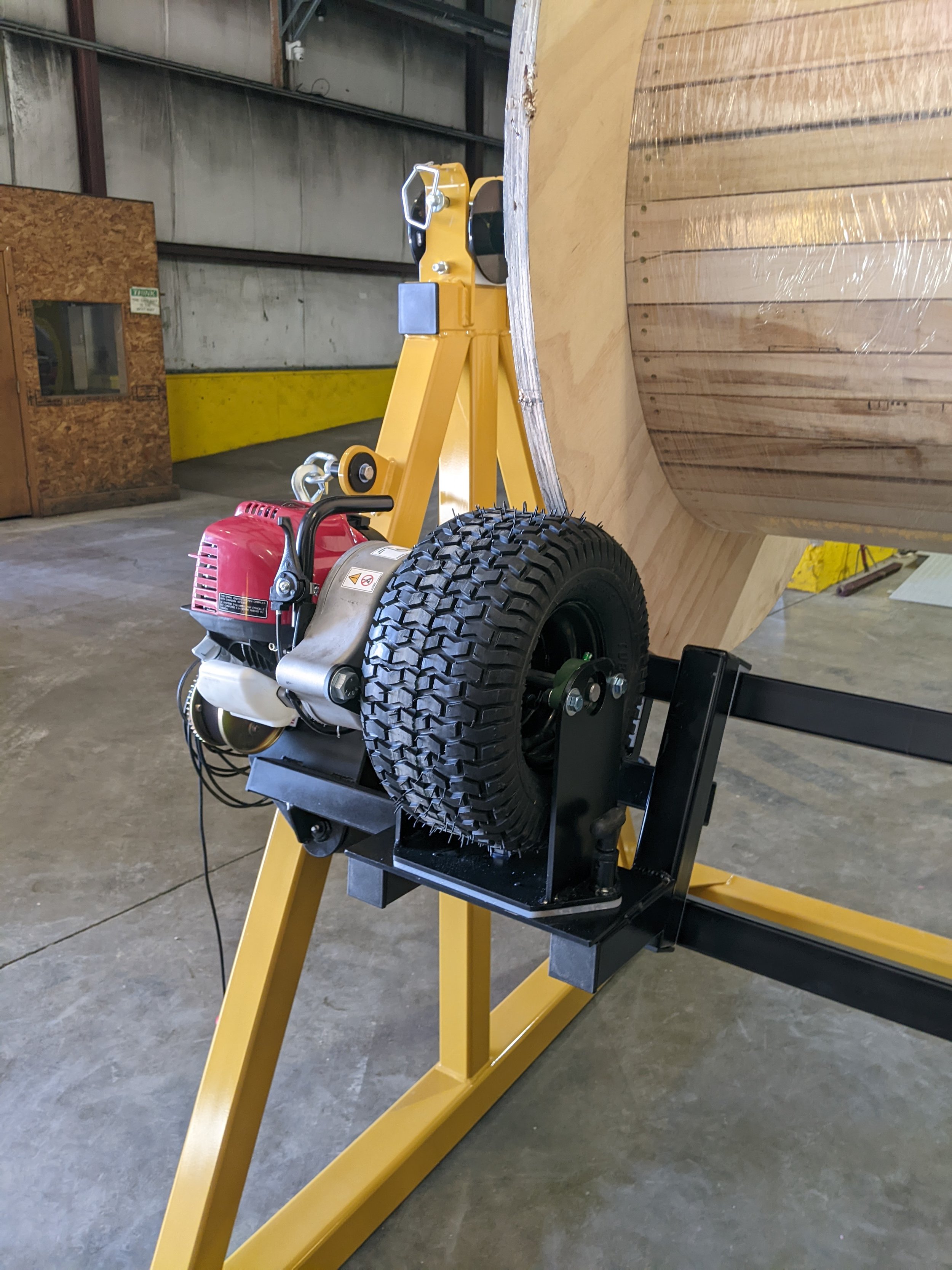Close up view of reel stand gas powered rewind