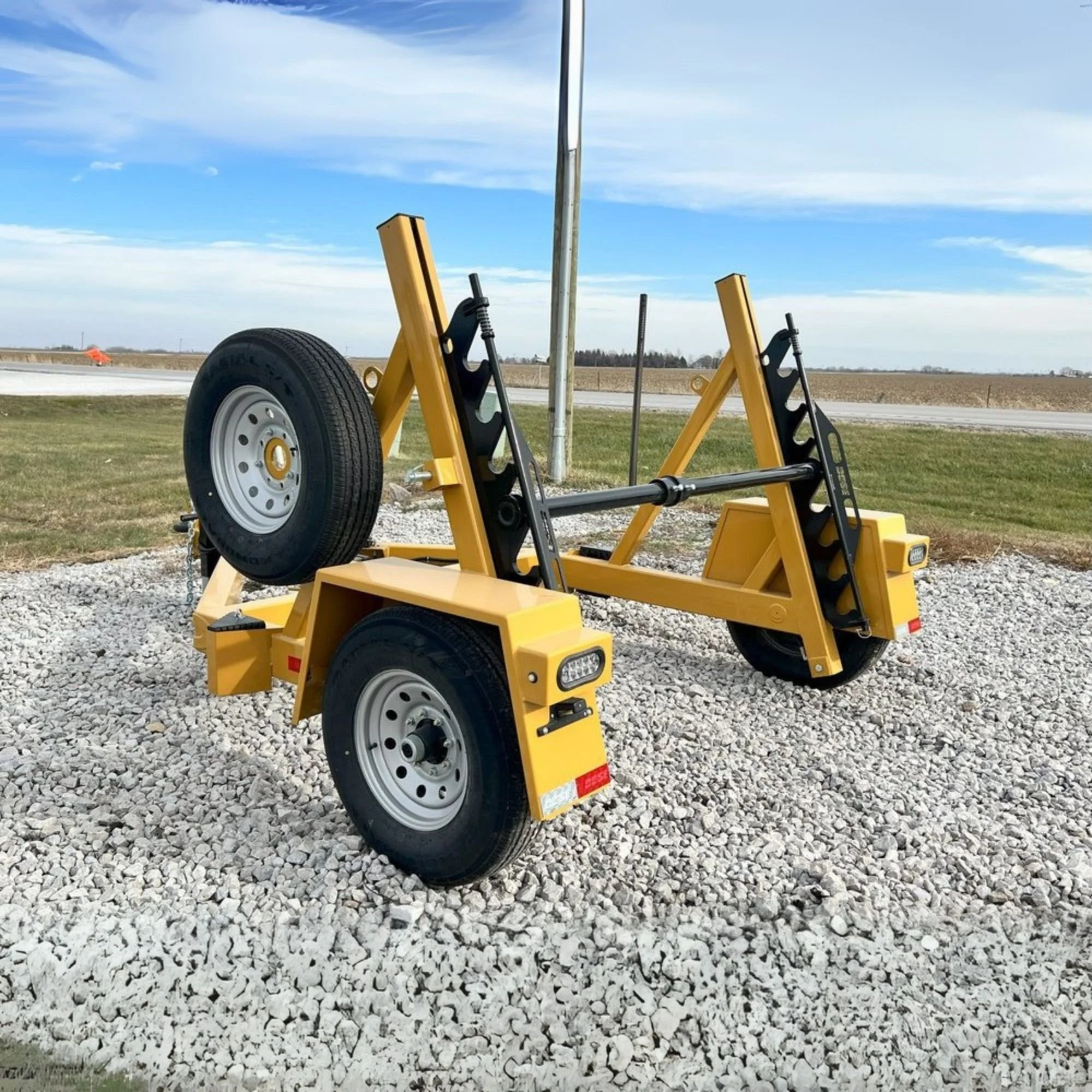 Side back angled view of a 7K CG Single Reel Self Loading Trailer sold by Maverick, Inc. located in Story City, Iowa