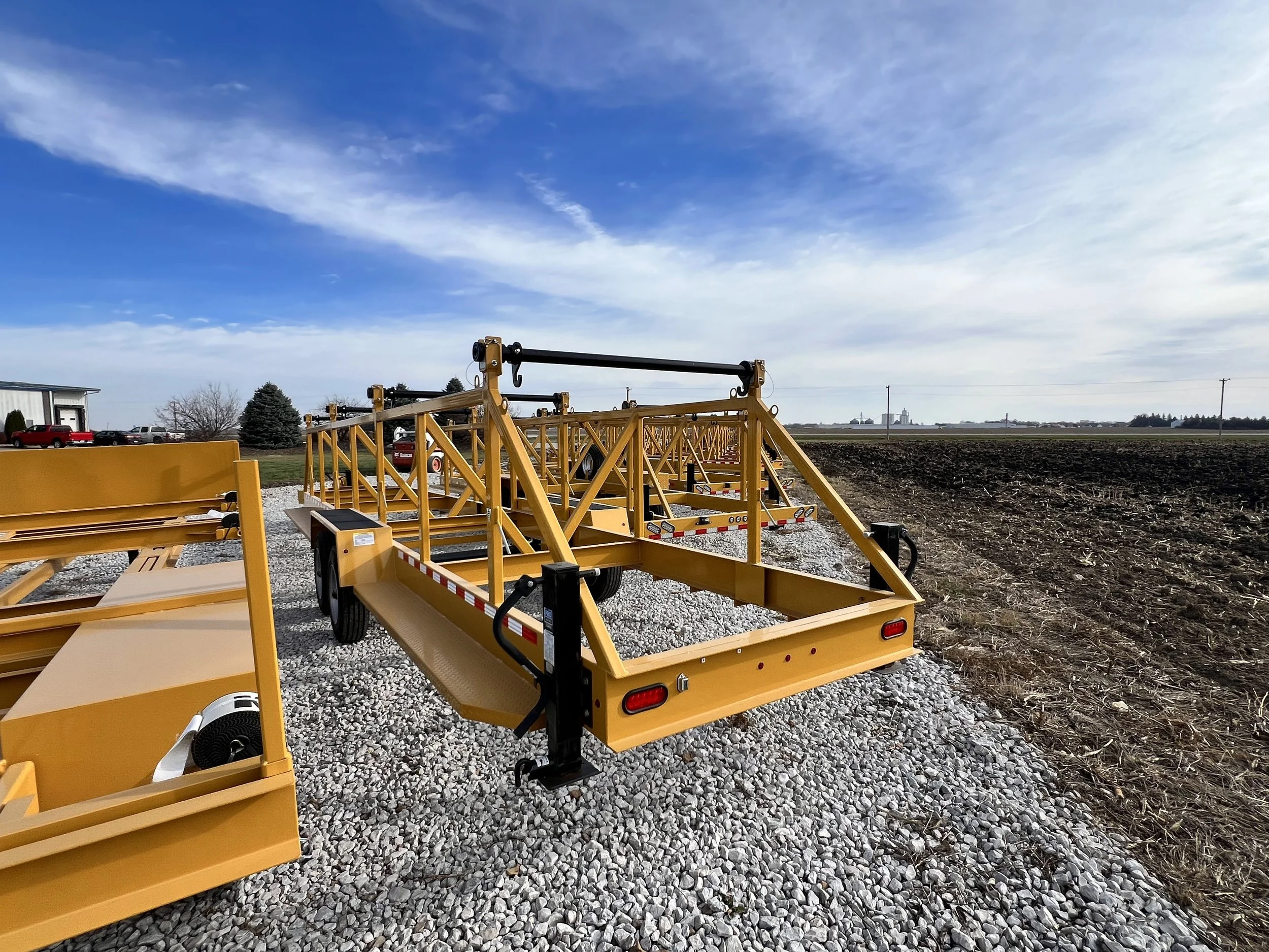 Option rear view of a Drop On 4 Reel or Four Reel Cable, Duct or Innerduct Trailer. Used for Transport and installation of utility products.