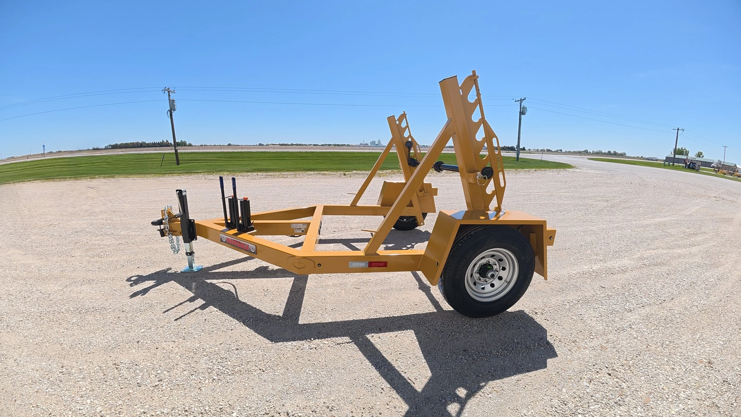 Single Reel Self Loading 7,000 lb. Axle Rated Trailer. From small fiber spools to large-diameter HDPE, PVC conduit, innerduct, and heavy electrical cable. Pump side view.